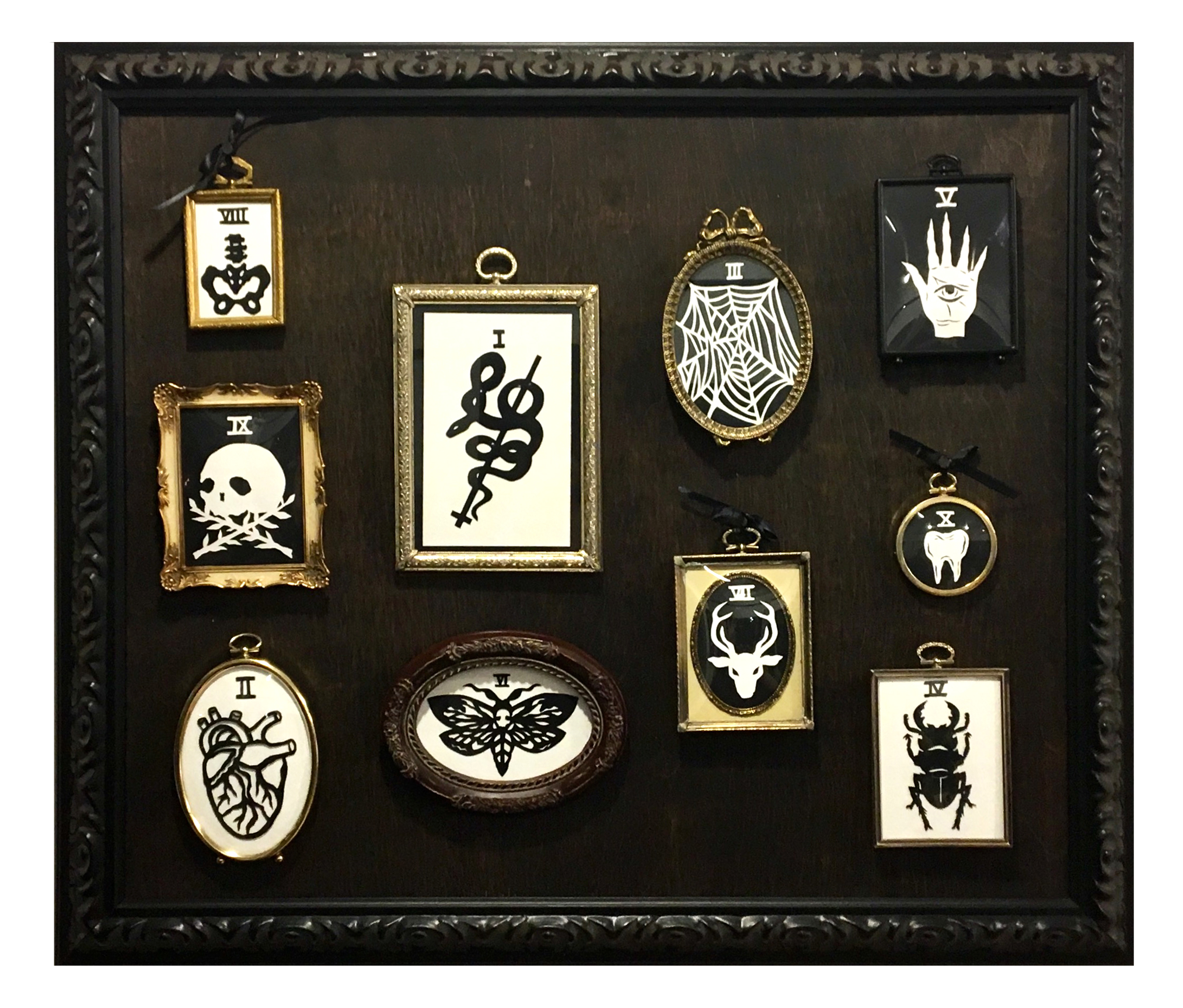   THE RELIQUARY  Hand cut paper 