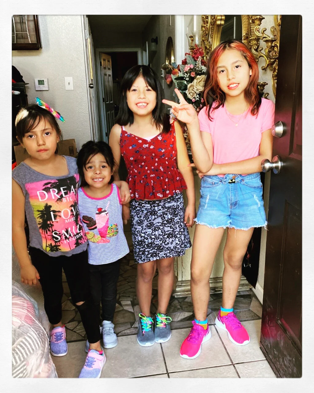 Fam of 4 gets new shoes - Slider Elementary School 