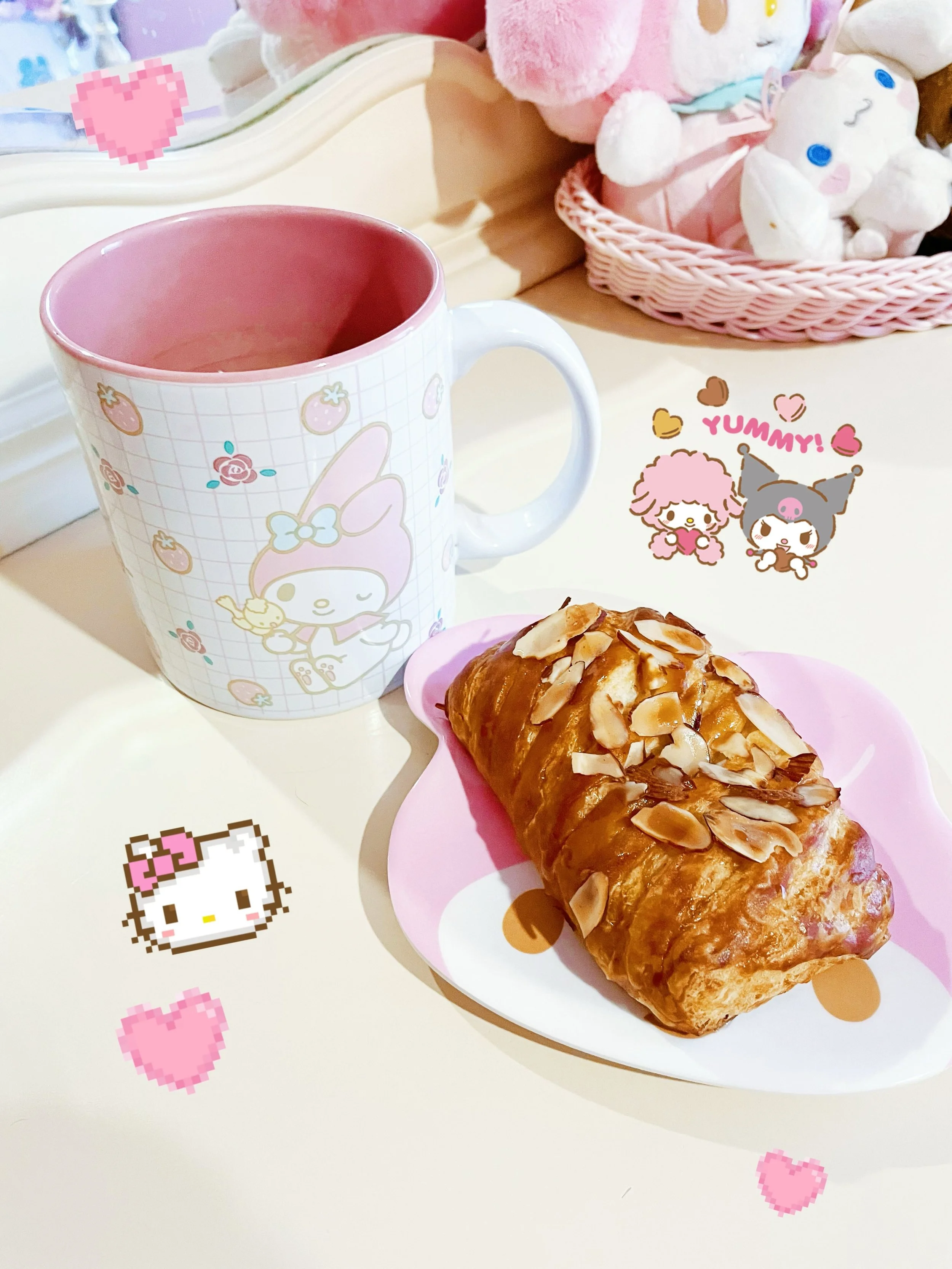 Bad start to my week with getting food poisoning but thankfully it wasn&rsquo;t too severe. I&rsquo;m feeling so much better so I treated myself to an almond croissant &amp; hot tea. Zeus always has to have a lick of my baked goods. 🥐🎀🩷 #food #cat