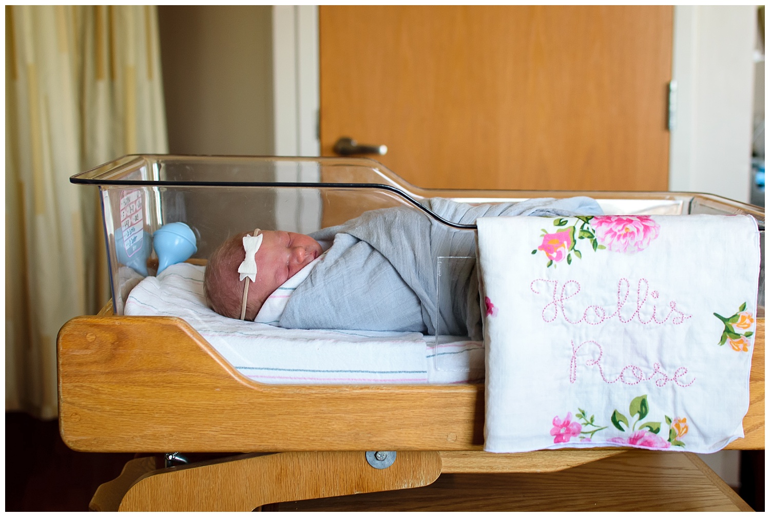 this is an image of a newborn baby girl sleeping in her bassinet at piedmont hospital during a fresh 48 session