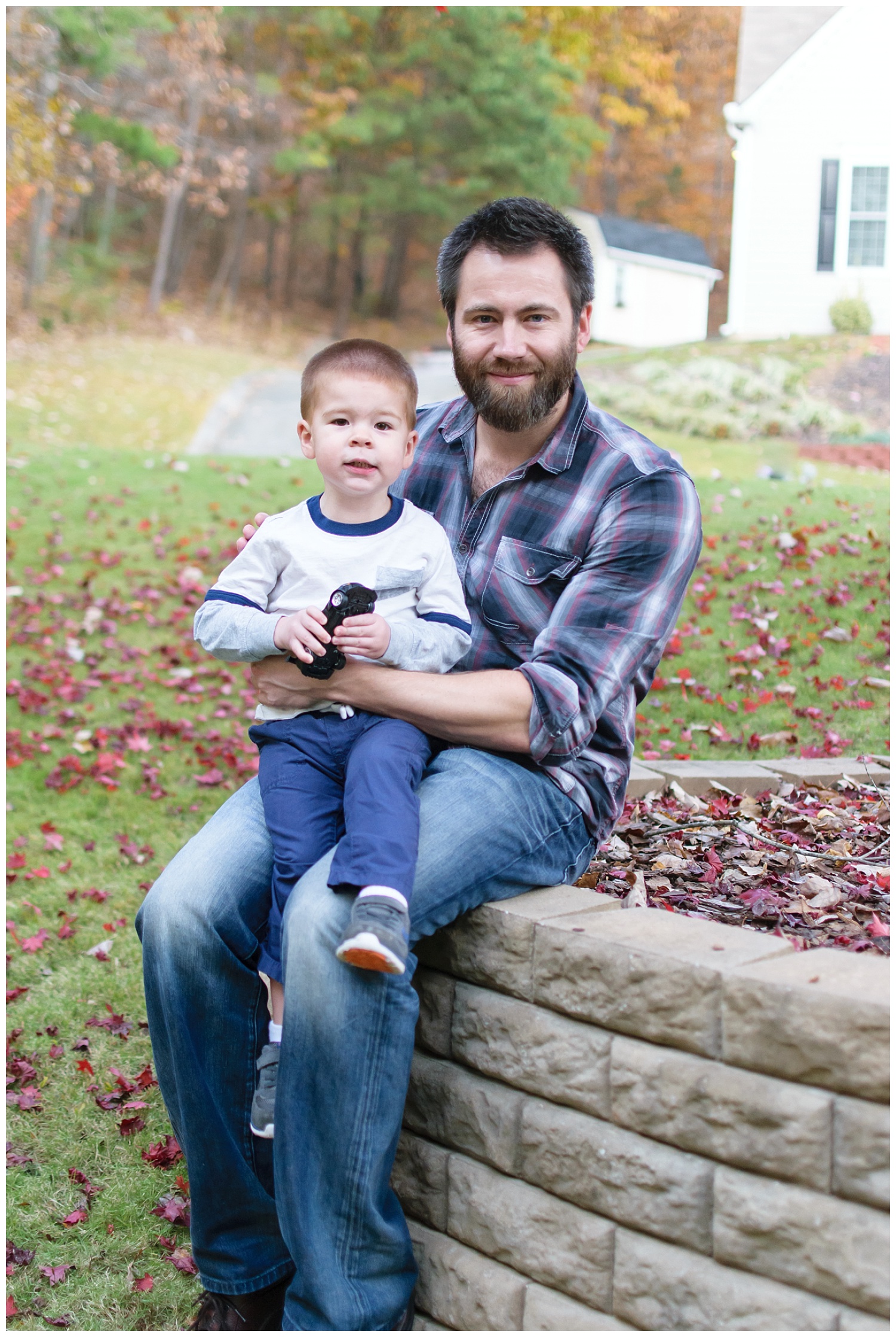 this are images of a dad and his toddler son during a lifestyle in home session in marietta, georgia