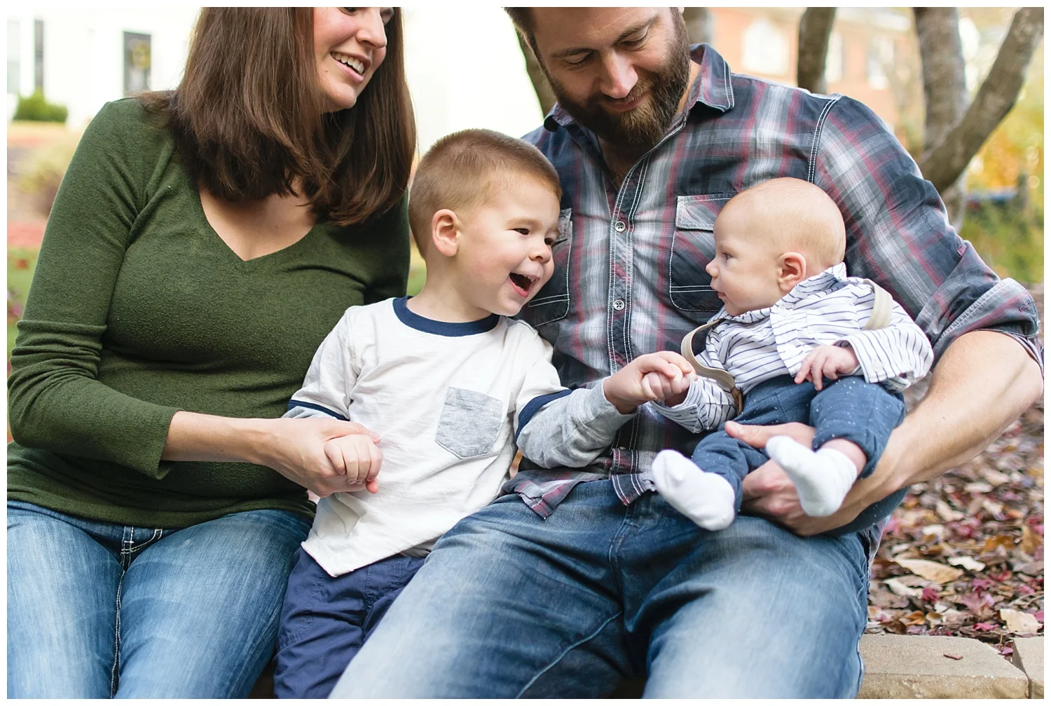 this is an image from a lifestyle family session, with the focus on the connection between the two young brothers. these were taken during an in home lifestyle session in marietta, georgia
