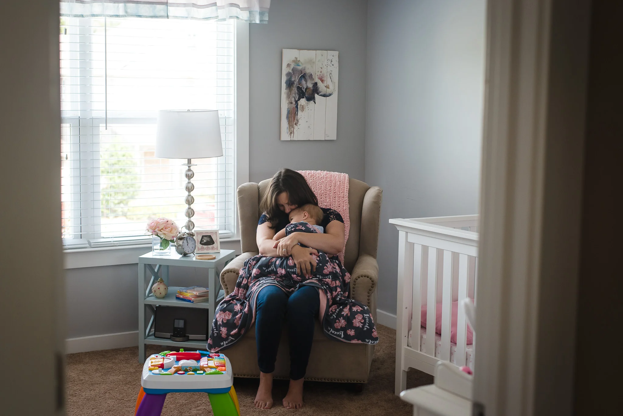 mom-holding-toddler-before-naptime-tabitha-maegan-photography