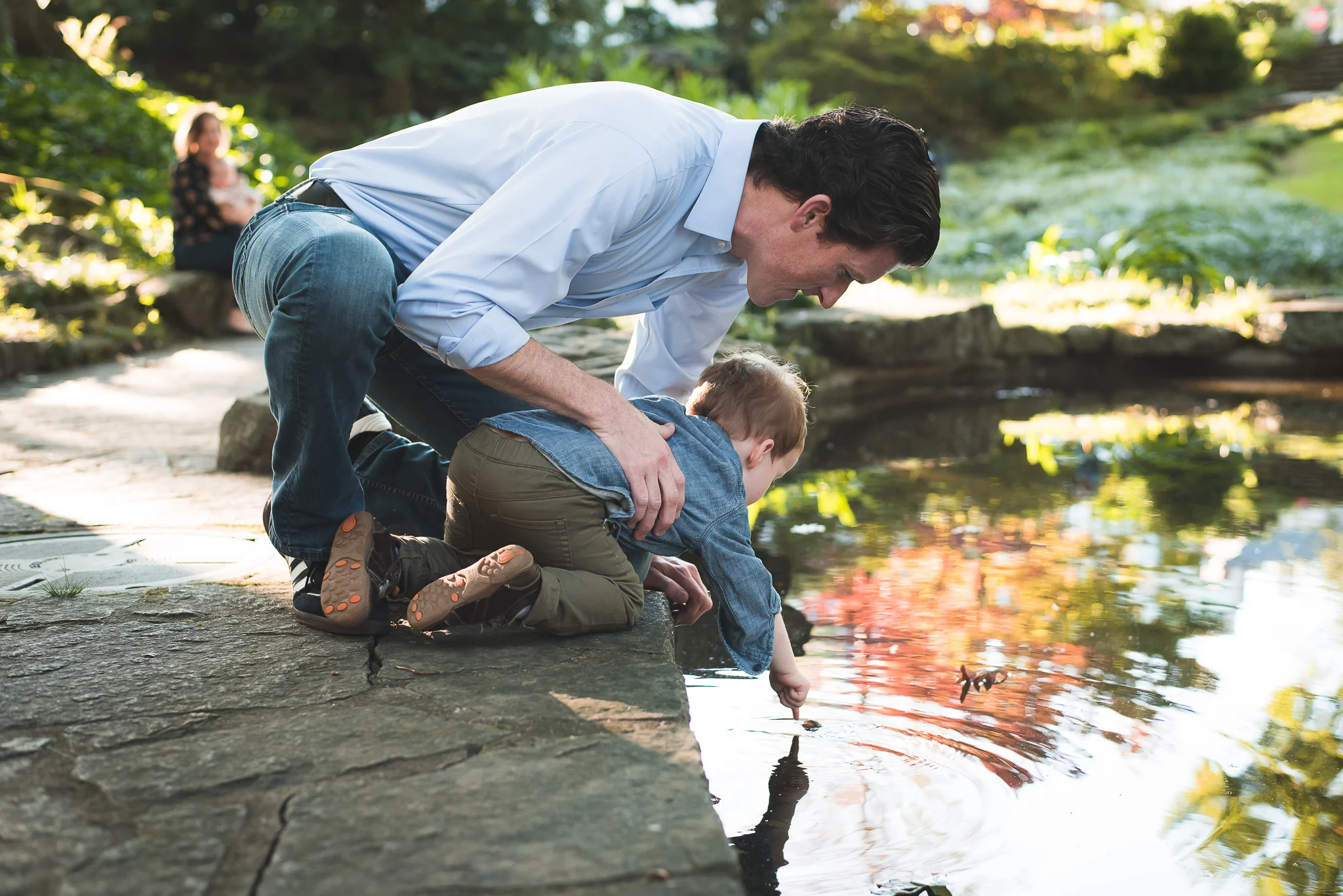 dad-son-looking-at-pond-winn-park-atlanta