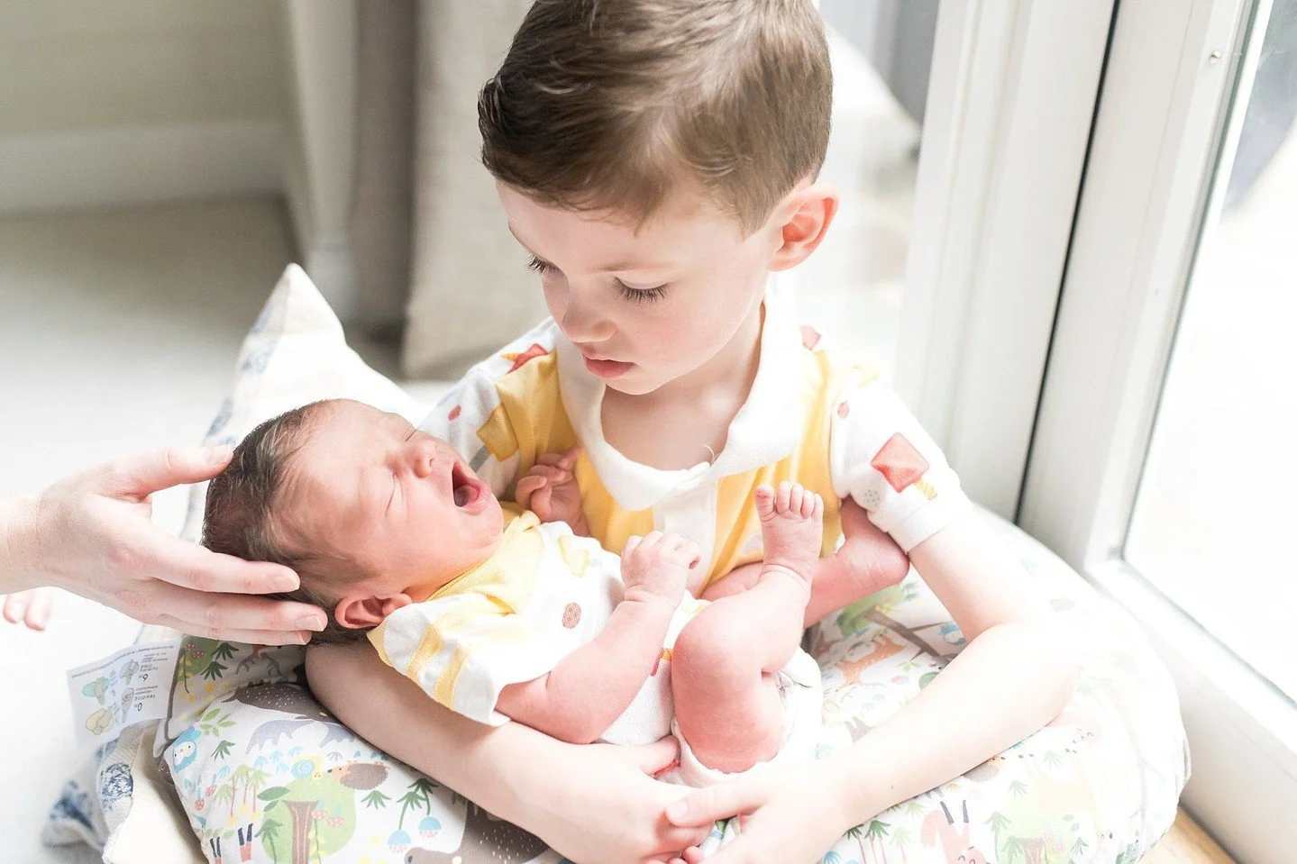Did you ever worry that your toddler wouldn't participate in the newborn session? I had no worries about this big brother!