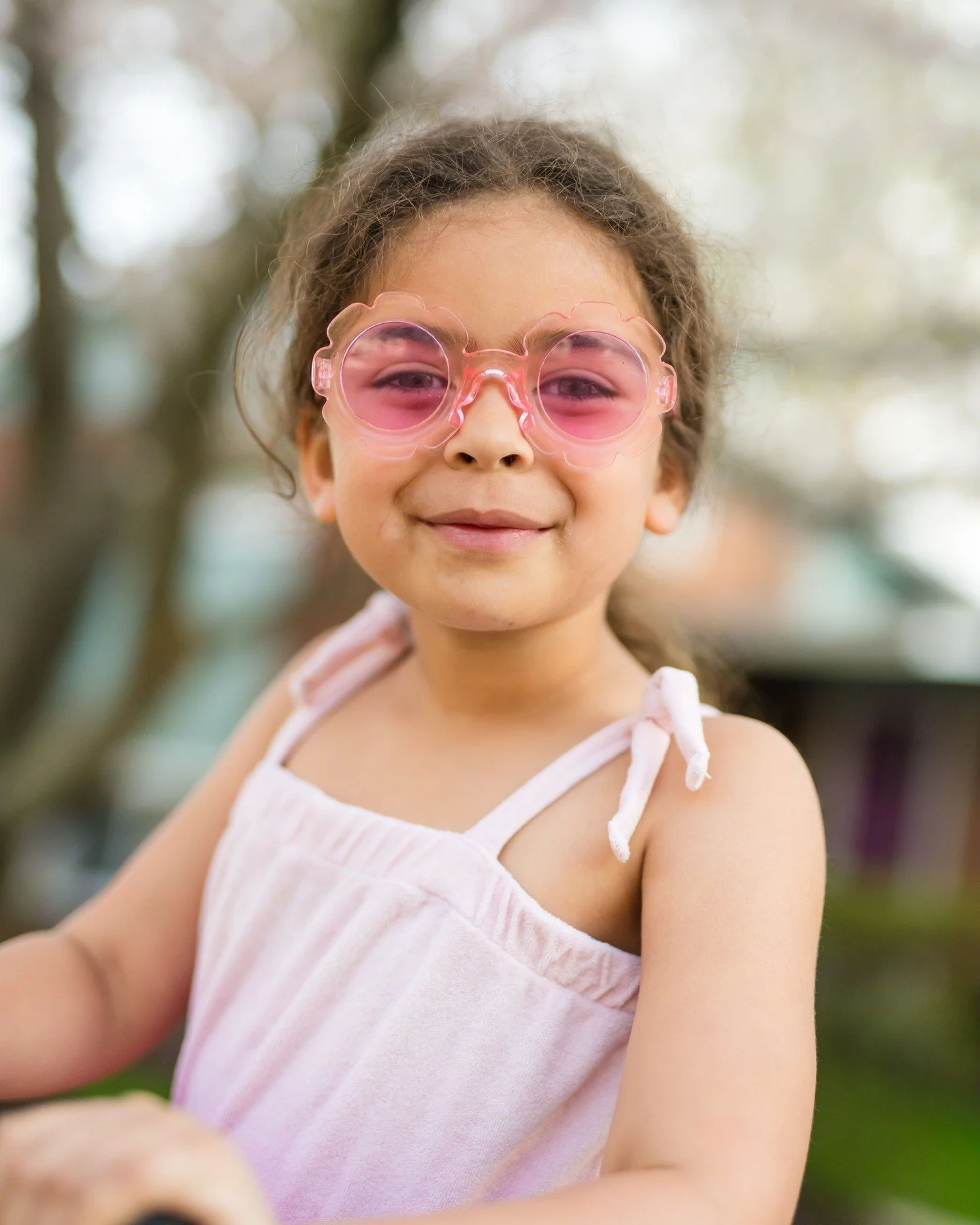 My lens was cropped in a little tight so you couldn't see that she was on her scooter. Who wants to document outdoor family fun during their next in home session? Let's make it happen!