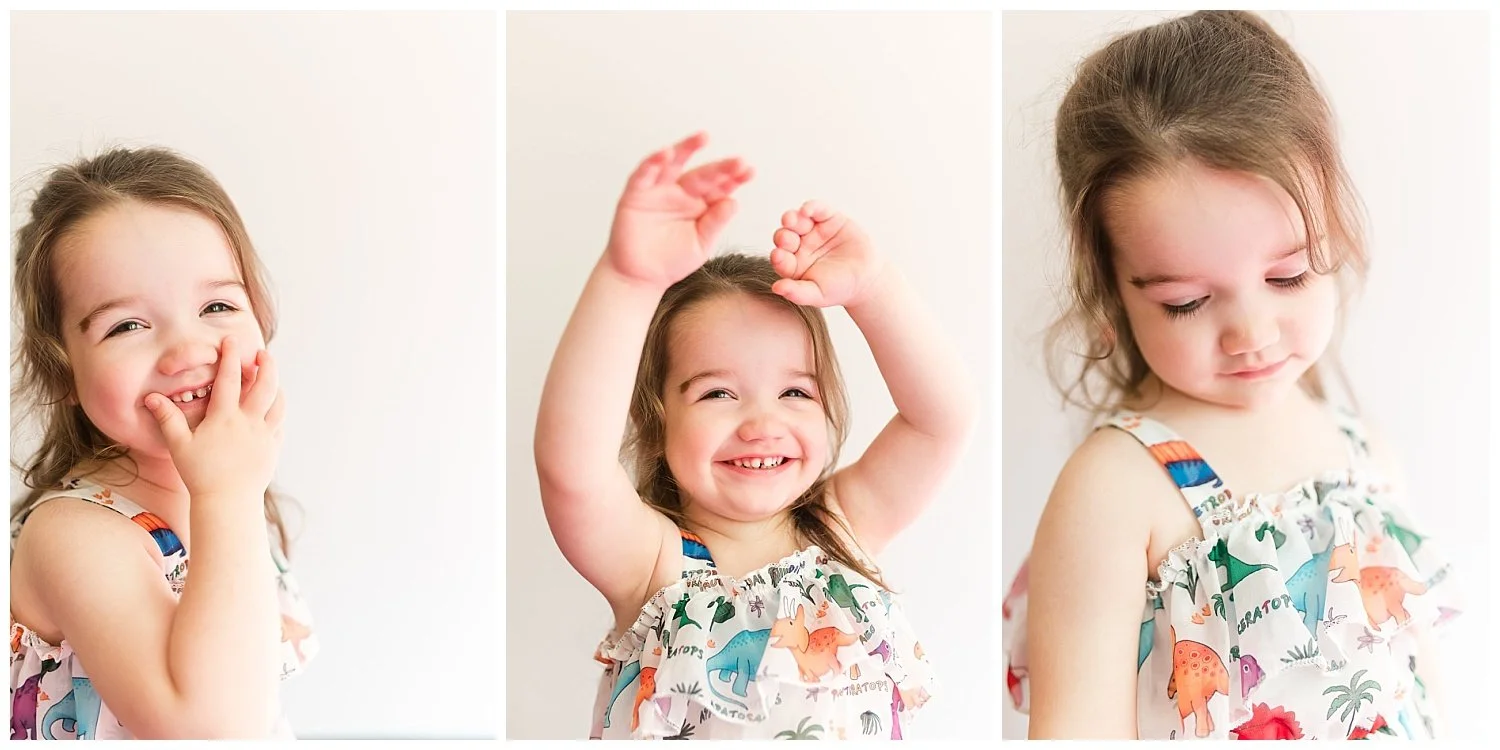 Playful child smiling during personality portrait session at Pink Moon Moms in Bethesda Maryland.