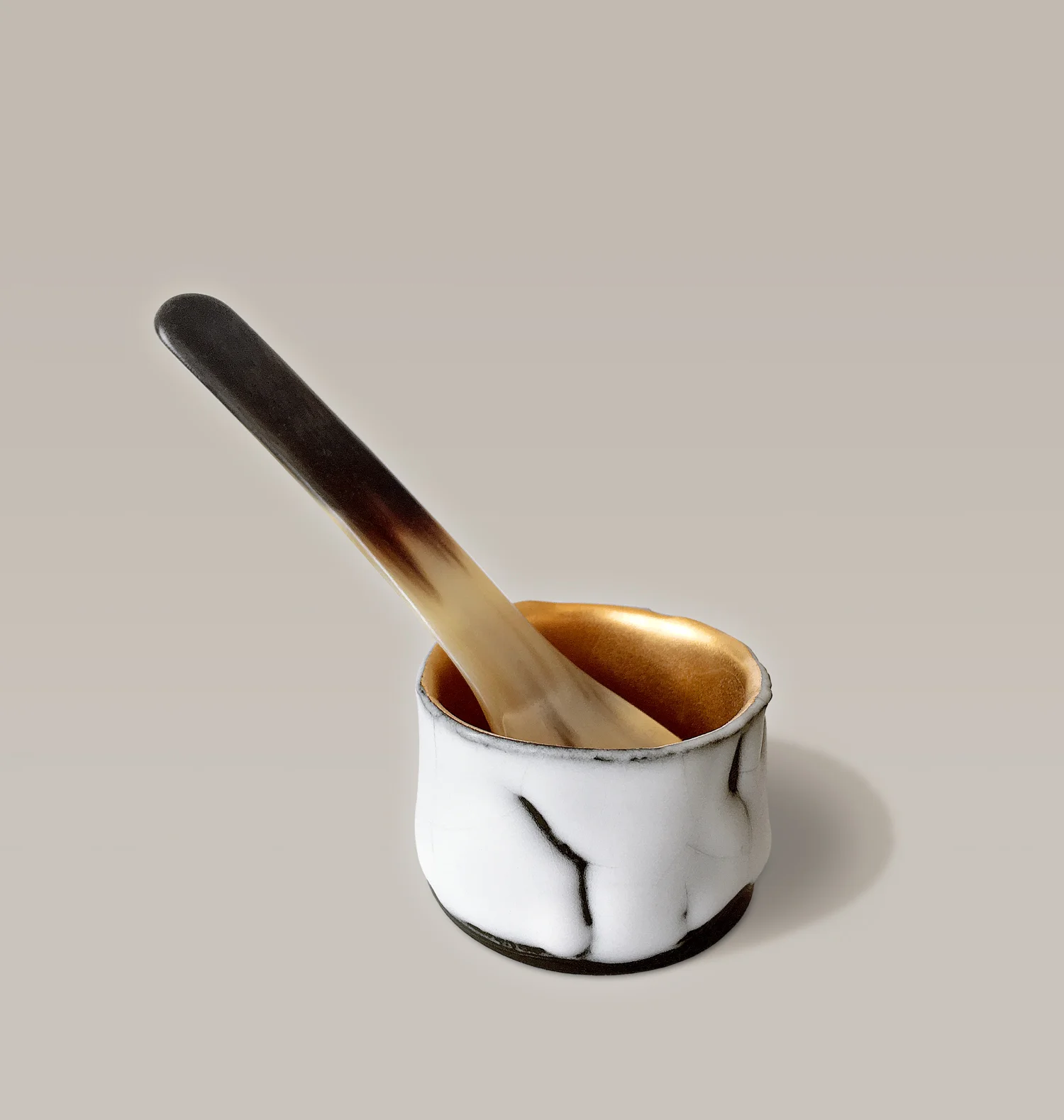 GROTTO • salt cellar • cast black china • carat gold enamel