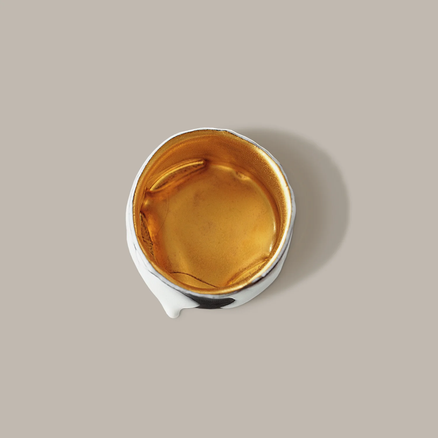 GROTTO • salt cellar • cast black china • carat gold enamel