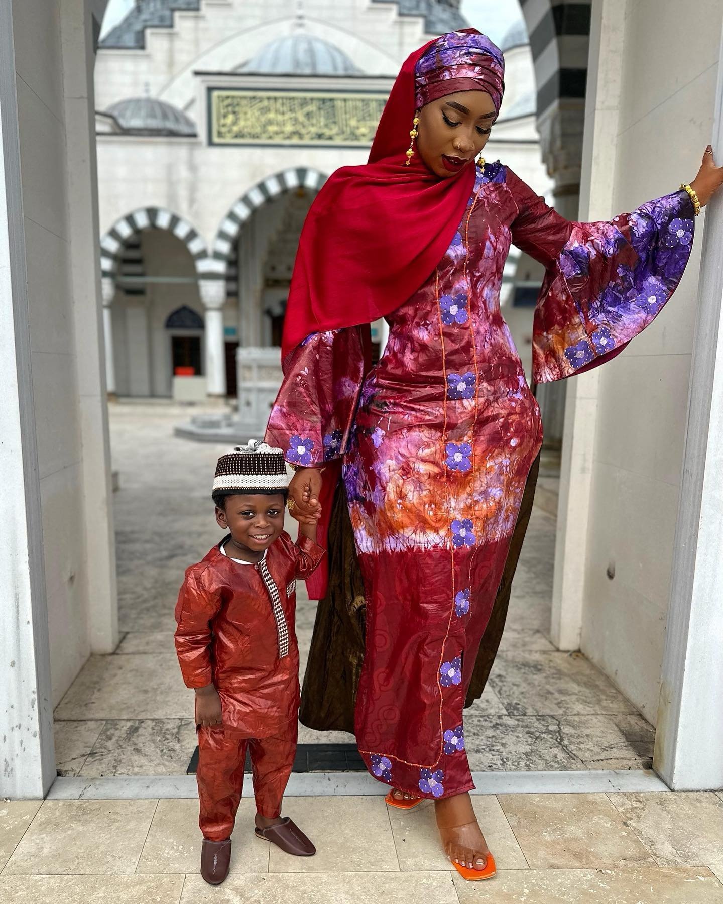 Loving the son/mom matching cultural maroon and purple fit from @khadeejahxceesay