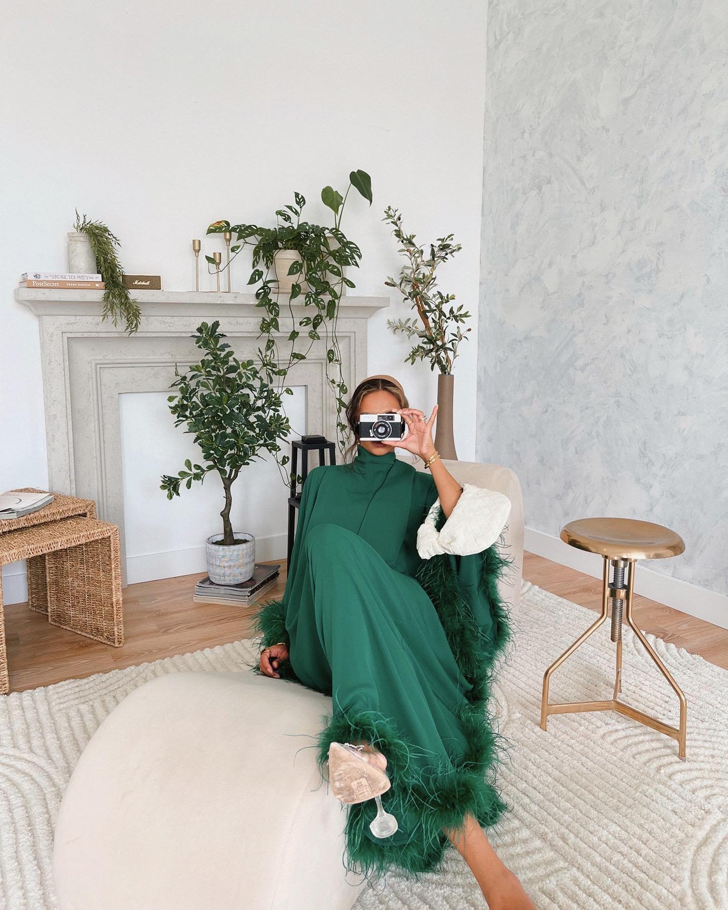 @zaheee22 stuns in her elegant emerald green feathered vintage dress