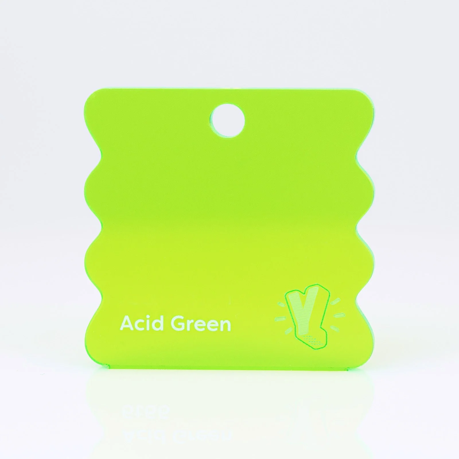 A sample of acrylic plastic labeled "Acid Green" with a decorative wavy edge and a small YEAH laser illustrated icon in the bottom right corner.