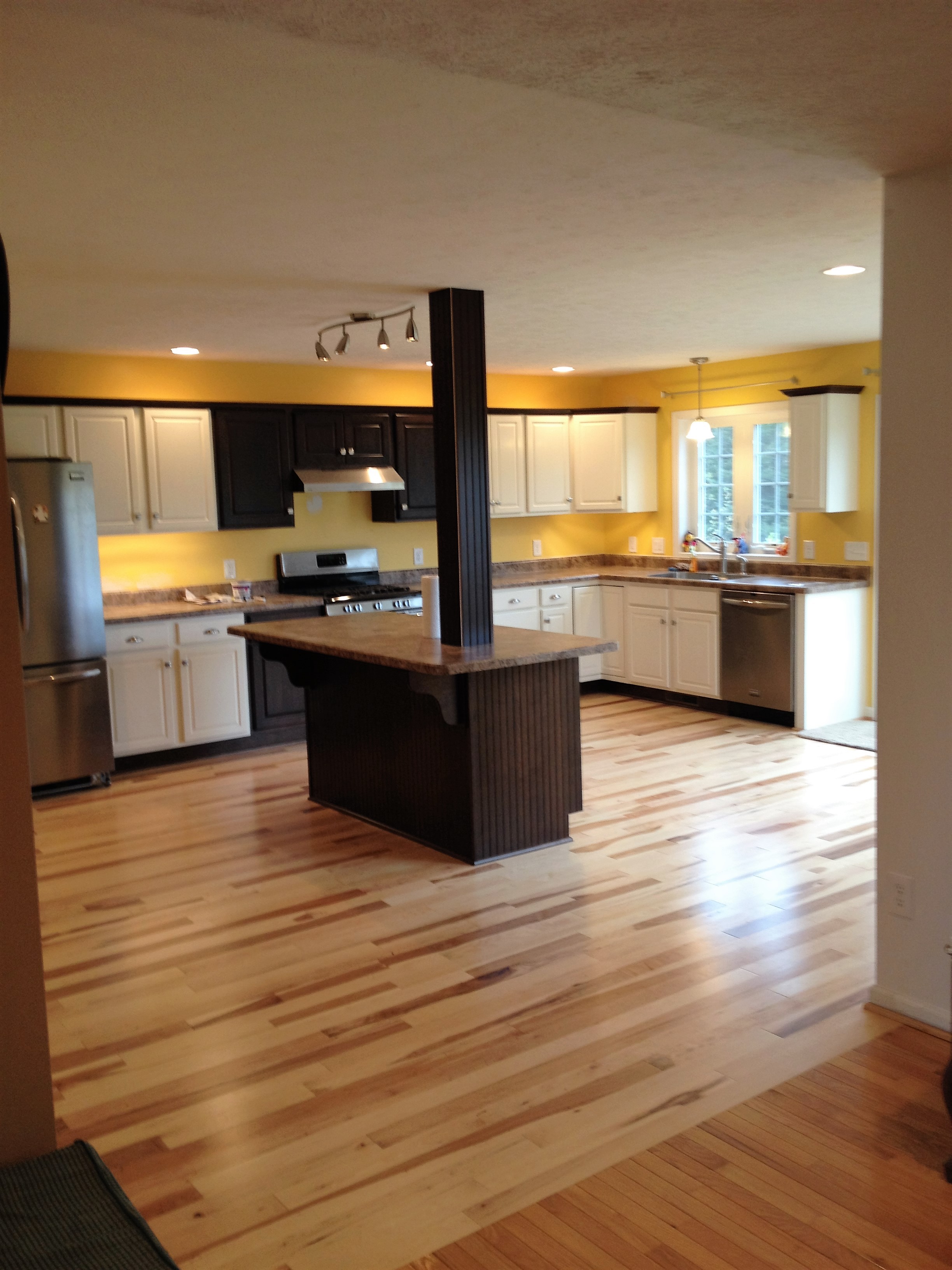 A new kitchen, including a gorgeous wood floor