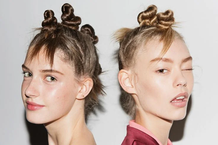 Marc Jacobs just being a genius and inventing Bantu knots.