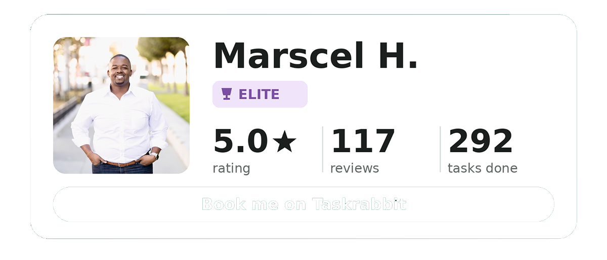 Profile card of Marscel H., an elite freelancer with a 5-star rating, 117 reviews, and 292 tasks completed, featuring a portrait of him smiling outdoors and a green "Book me on Taskrabbit" button.