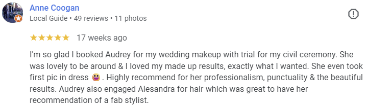 Screenshot of a hyperlinked Google review by Anne Coogan, praising Audrey for wedding makeup and hair styling, with five stars.