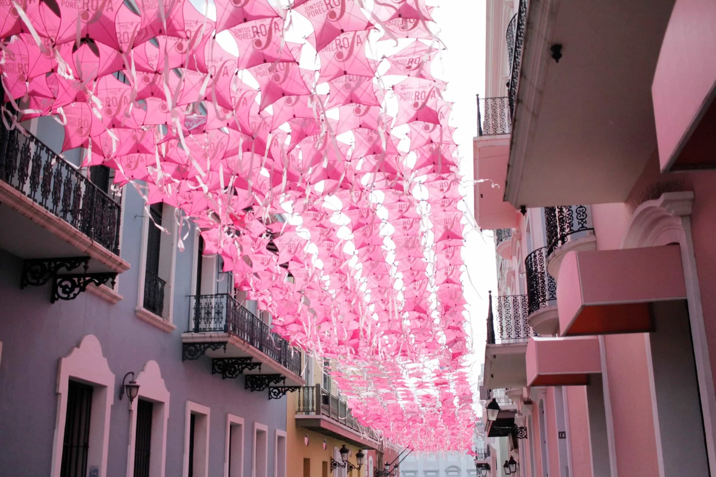 Umbrella Street in Viejo San Juan PR, pink kites overhead