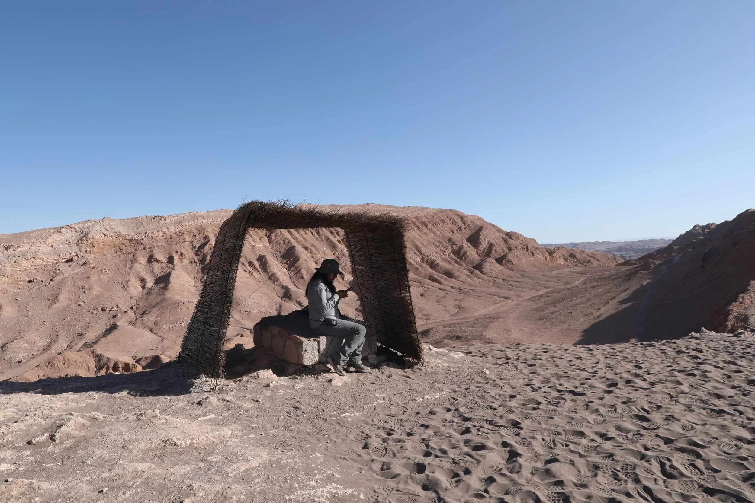 Valle de la Luna Chile, otherworldly landscape, girl at top of Great Dune