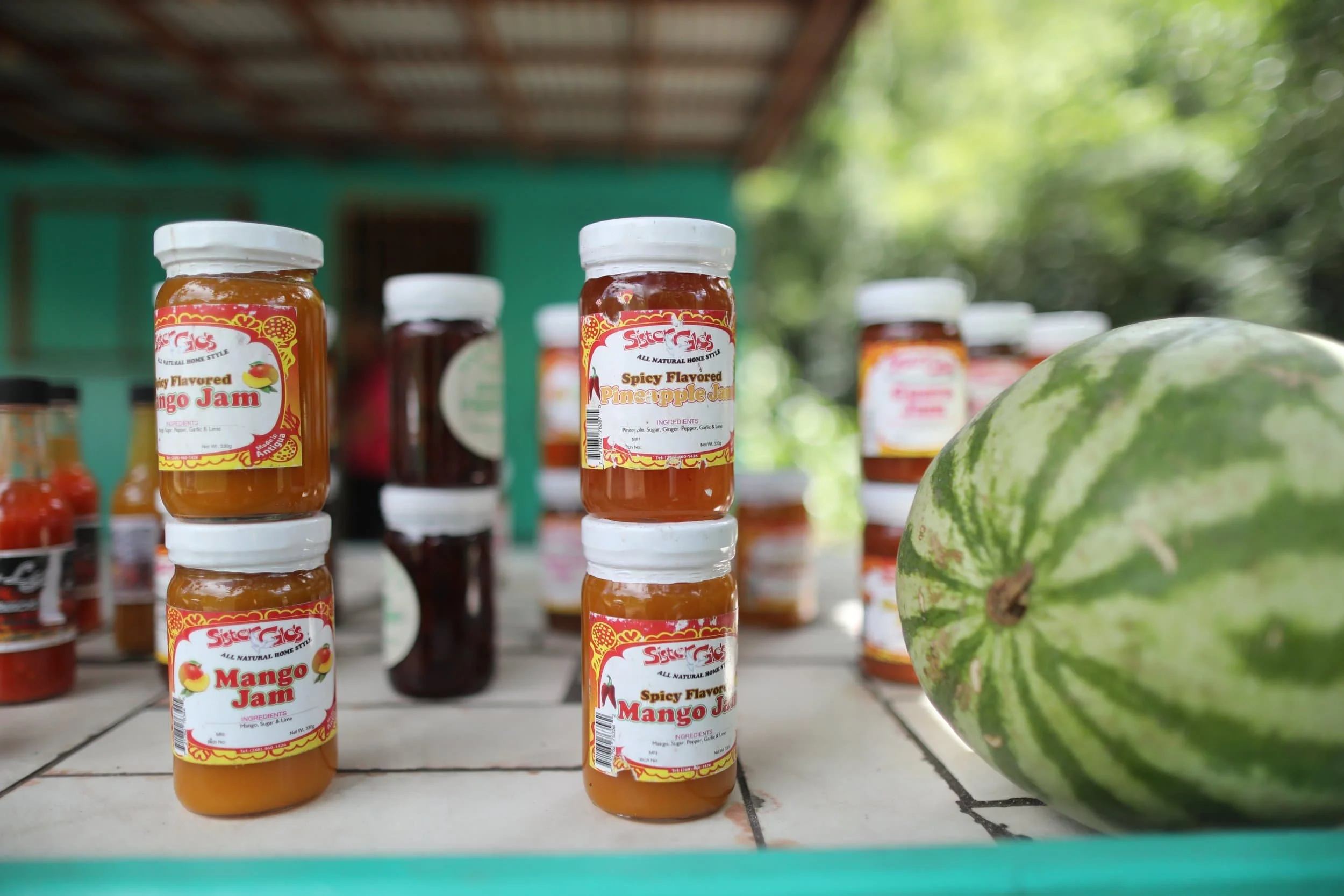 Jars of jam stacked at stall on Fig Tree Lane on Antigua island