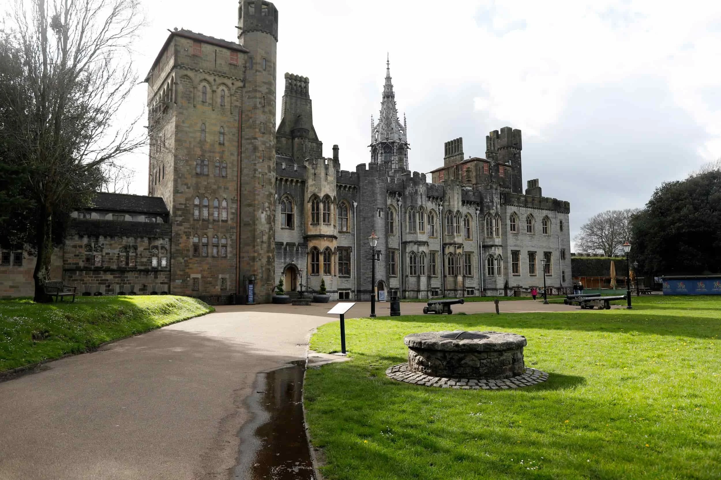 The Apartments at Cardiff Castle with green lawn and blue sky, Cardiff UK