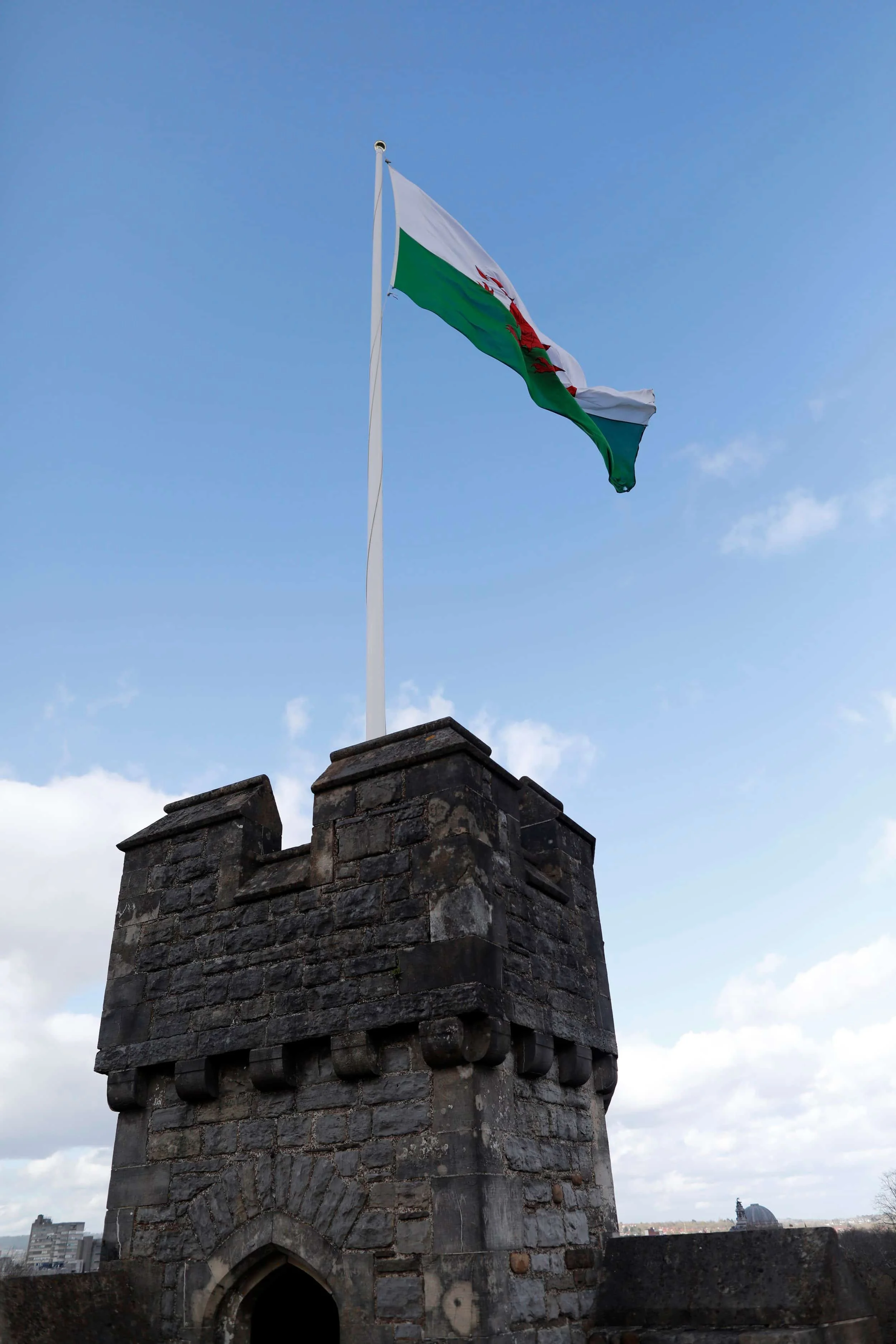 Views from atop Cardiff Castle to the keep and flag in the wind, Cardiff Wales