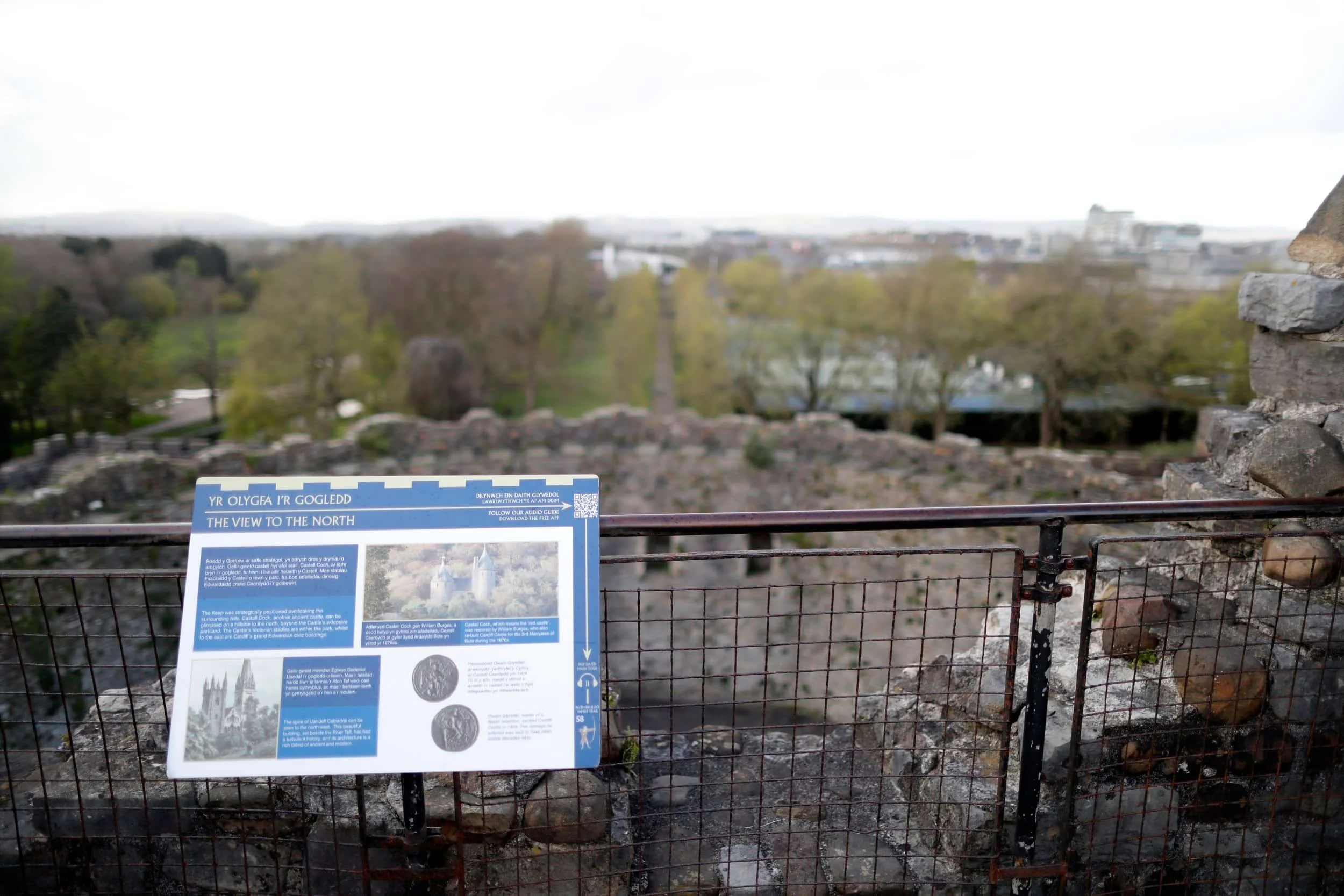 Views from atop Cardiff Castle to the surrounding landscape, posted sign, Cardiff Wales