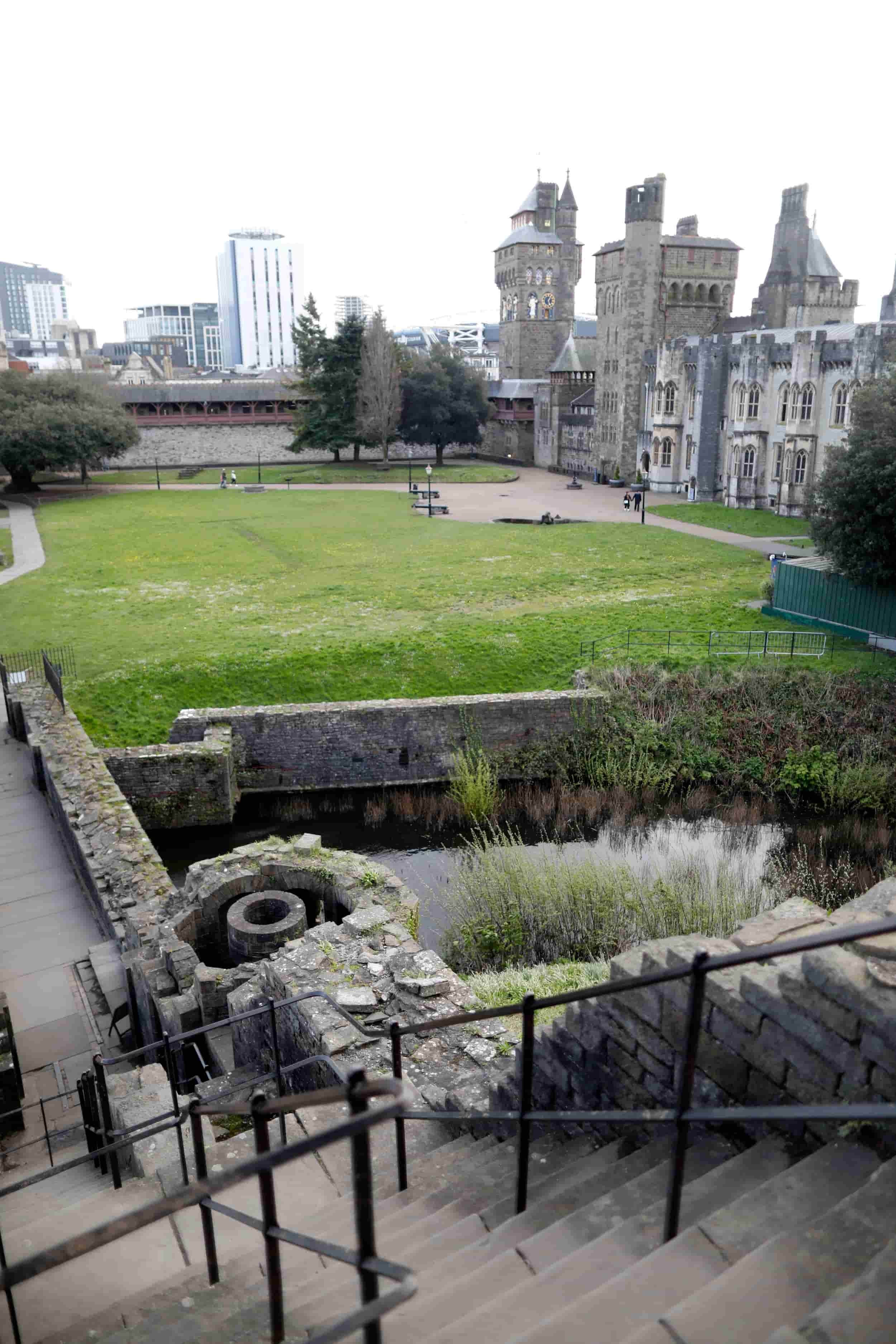 View from inside Cardiff Castle to the courtyard with green grass, Cardiff Wales