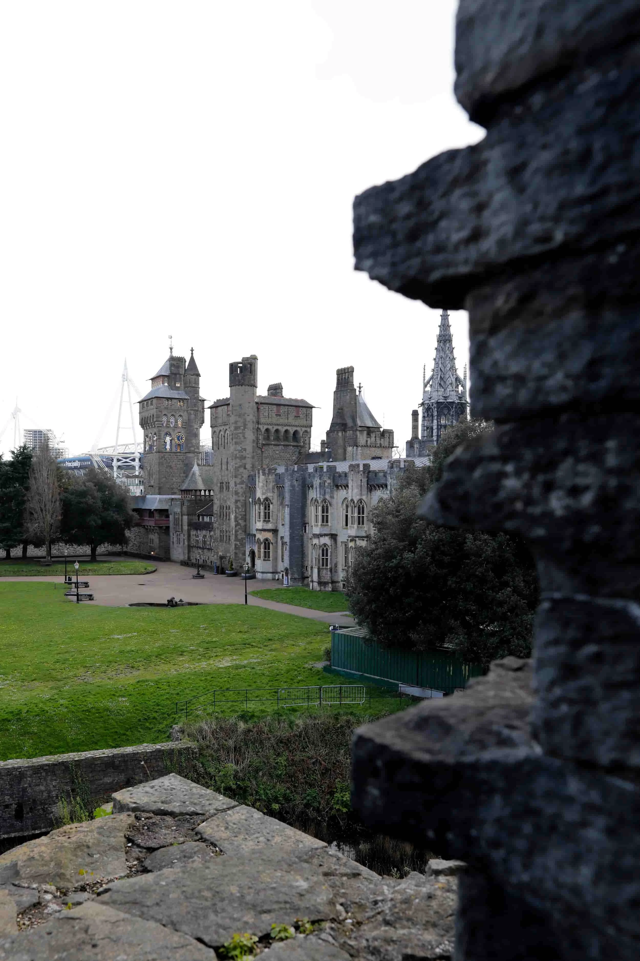 View from inside Cardiff Castle to the courtyard with green grass, Cardiff Wales