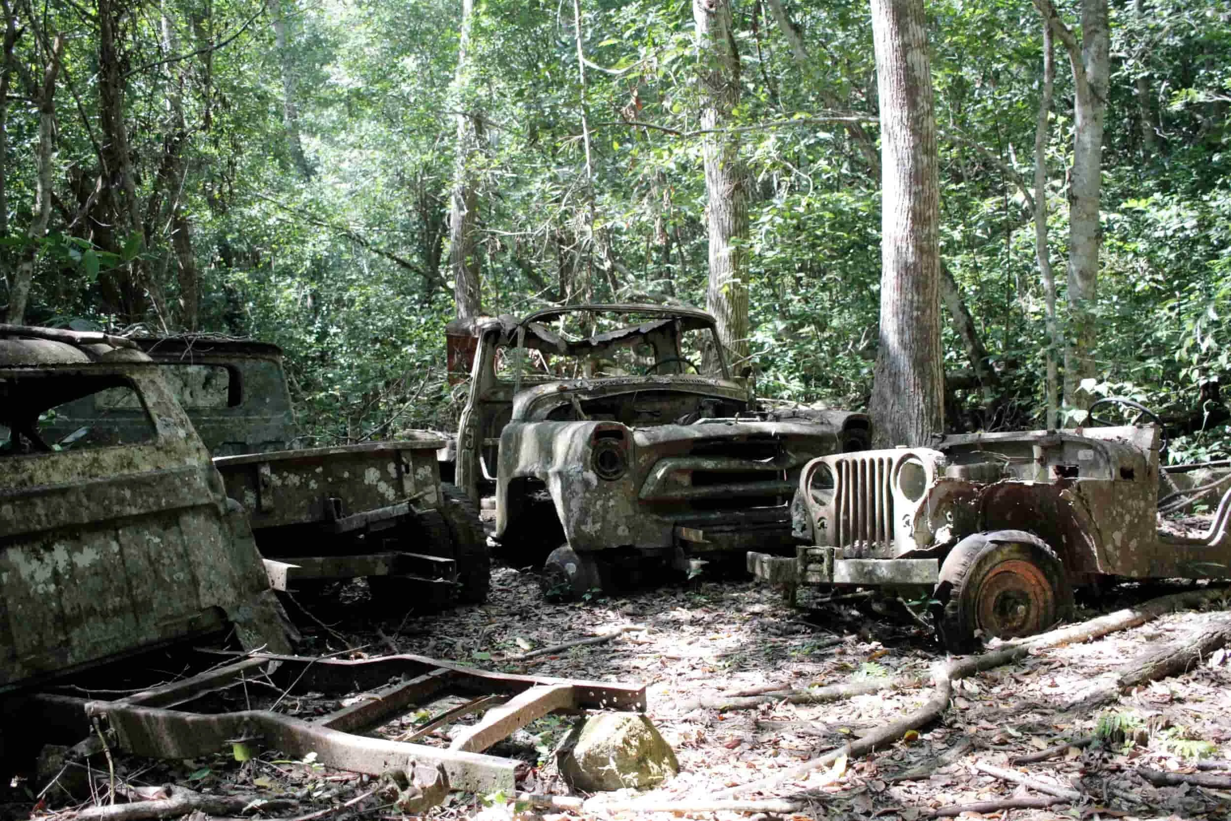 Old car remains in the jungle of Tikal National Park