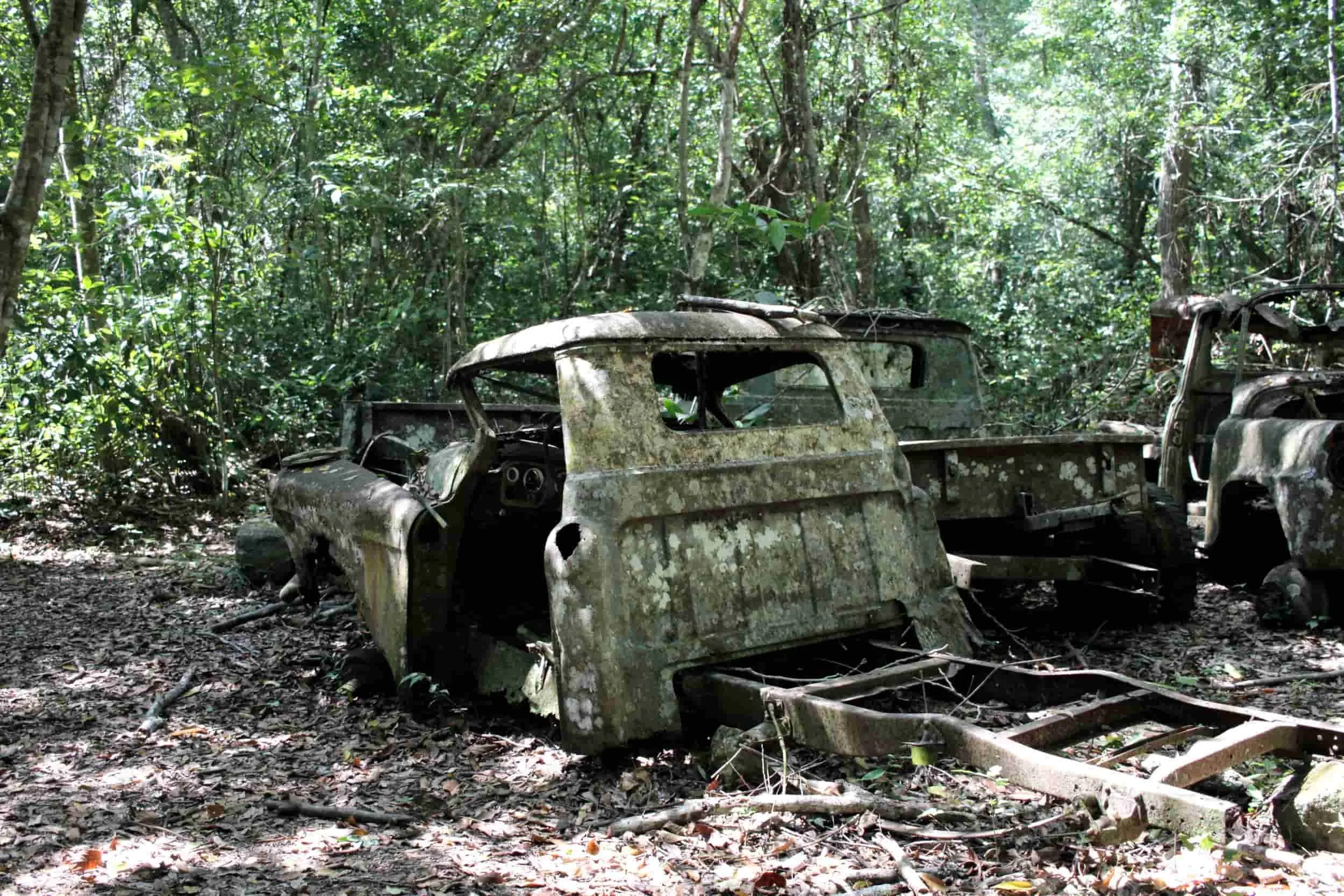 Old car remains in the jungle of Tikal National Park