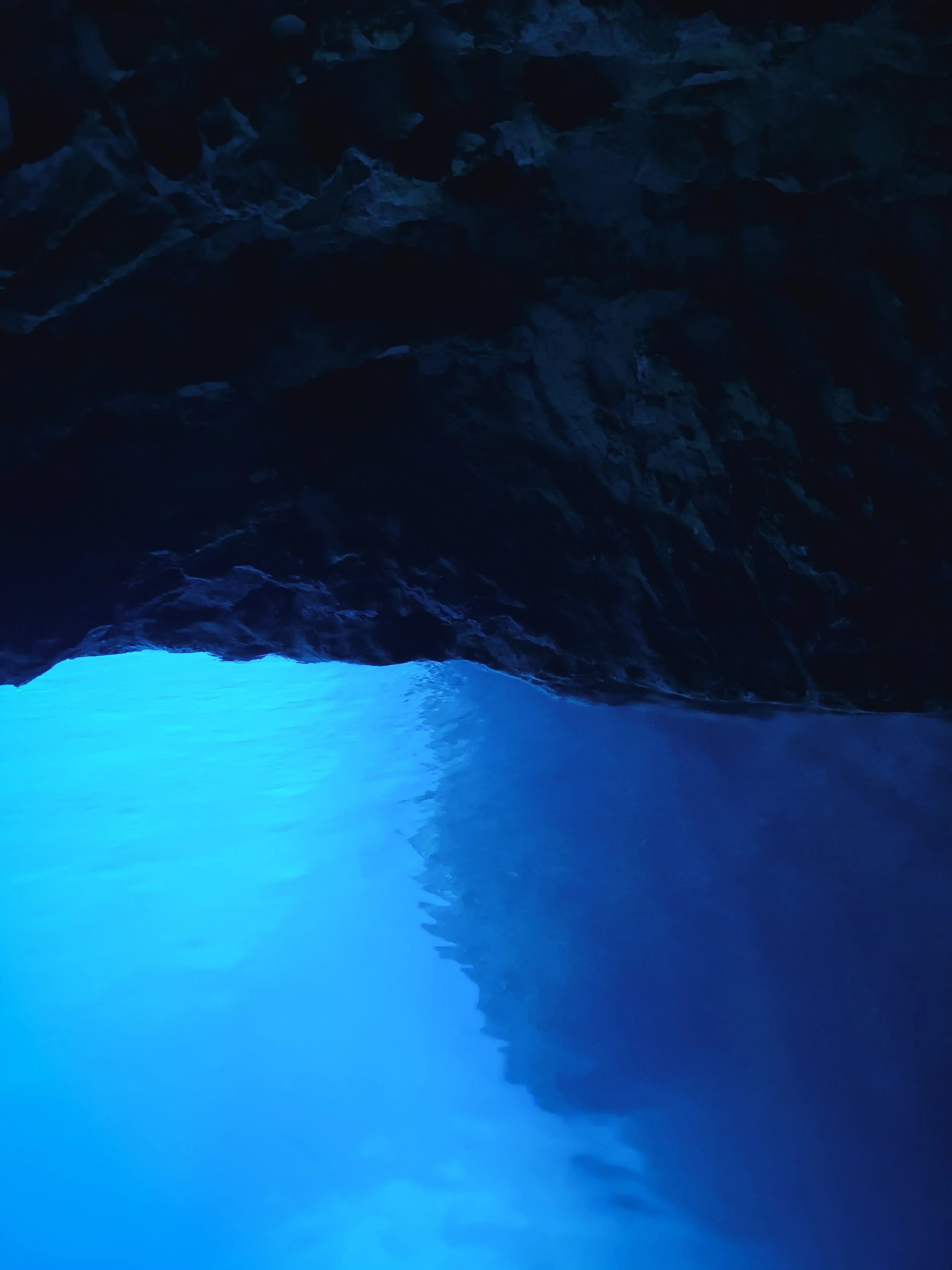 Rocky walls inside Blue Cave near Split Croatia