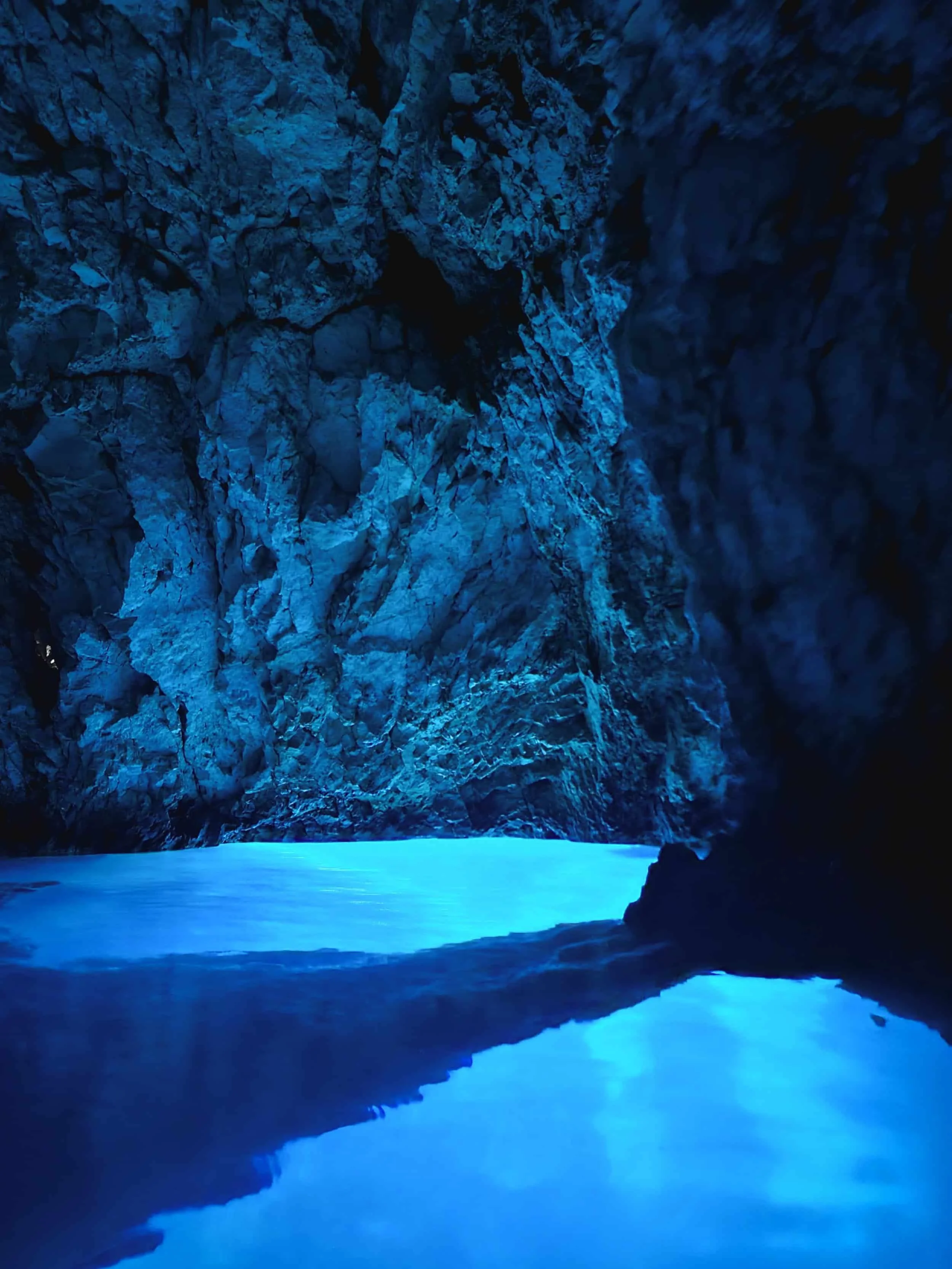 Rocky walls inside Blue Cave near Split Croatia