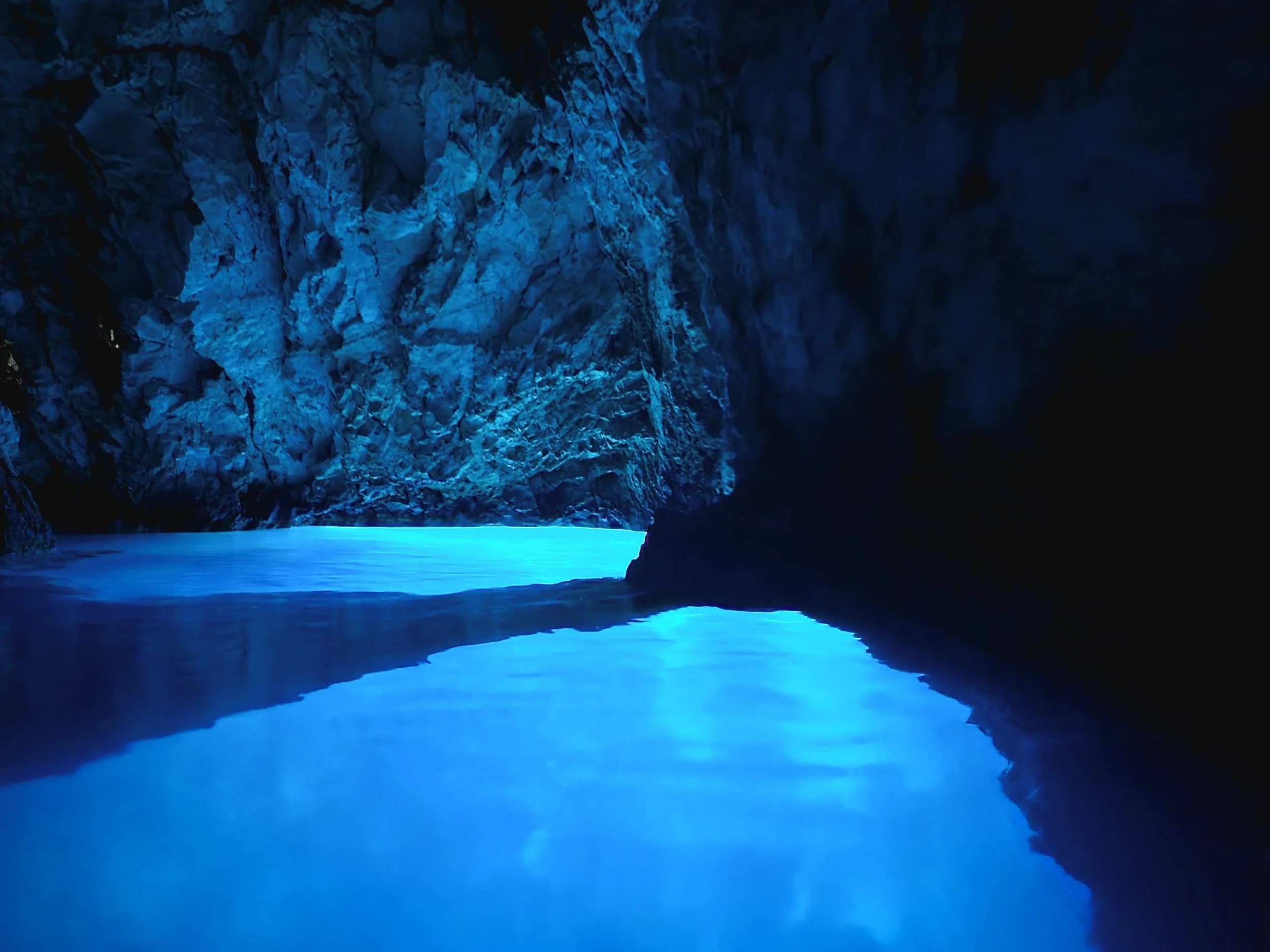 Rocky walls inside Blue Cave near Split Croatia