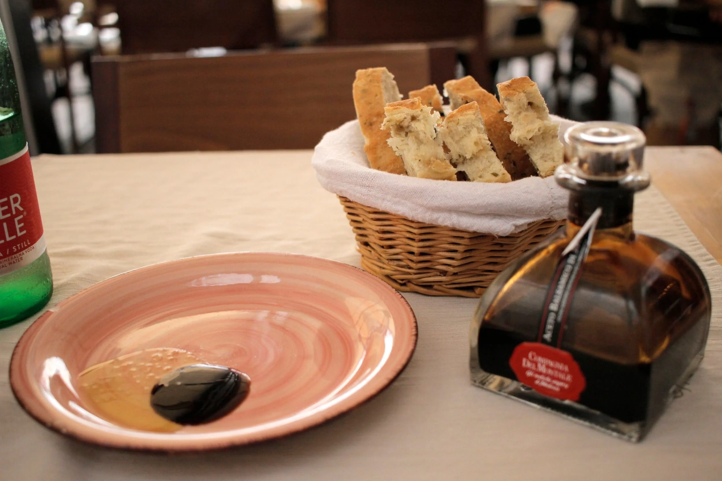 Table with bread and olive oil at restaurant in Hvar Island in Croatia