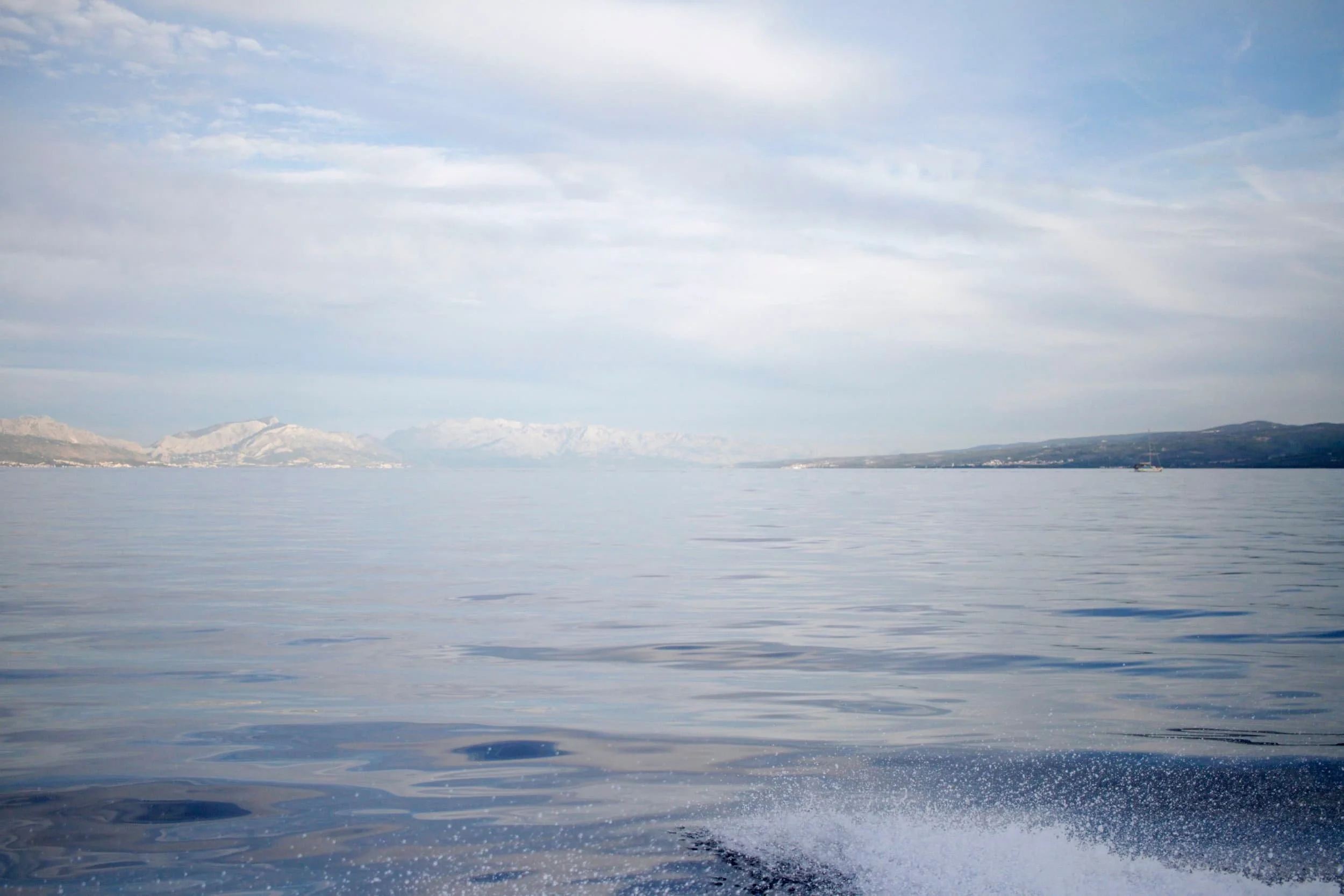 Sunset views of the Adriatic from a boat near split Croatia