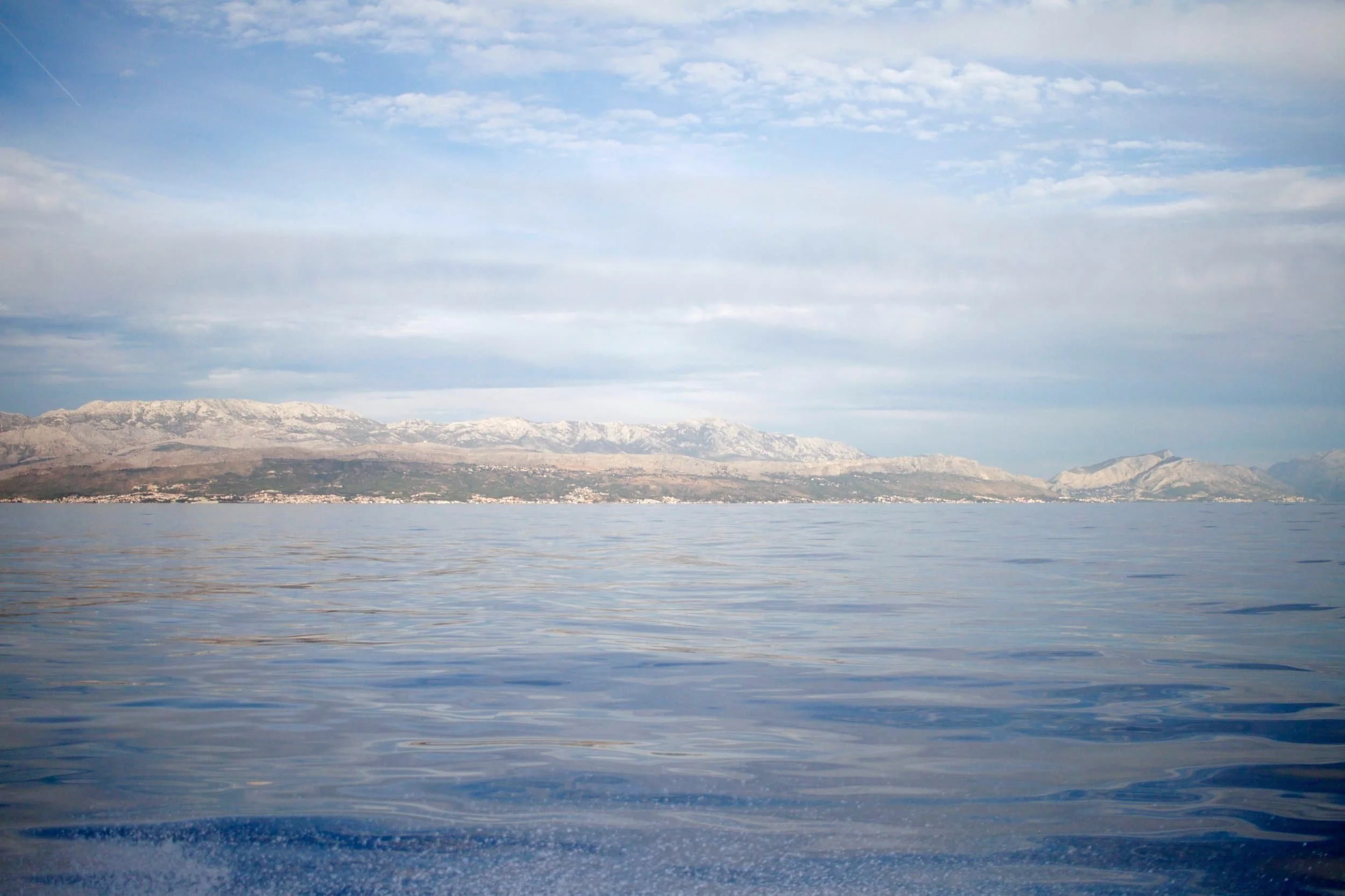 Sunset views of the Adriatic from a boat near split Croatia