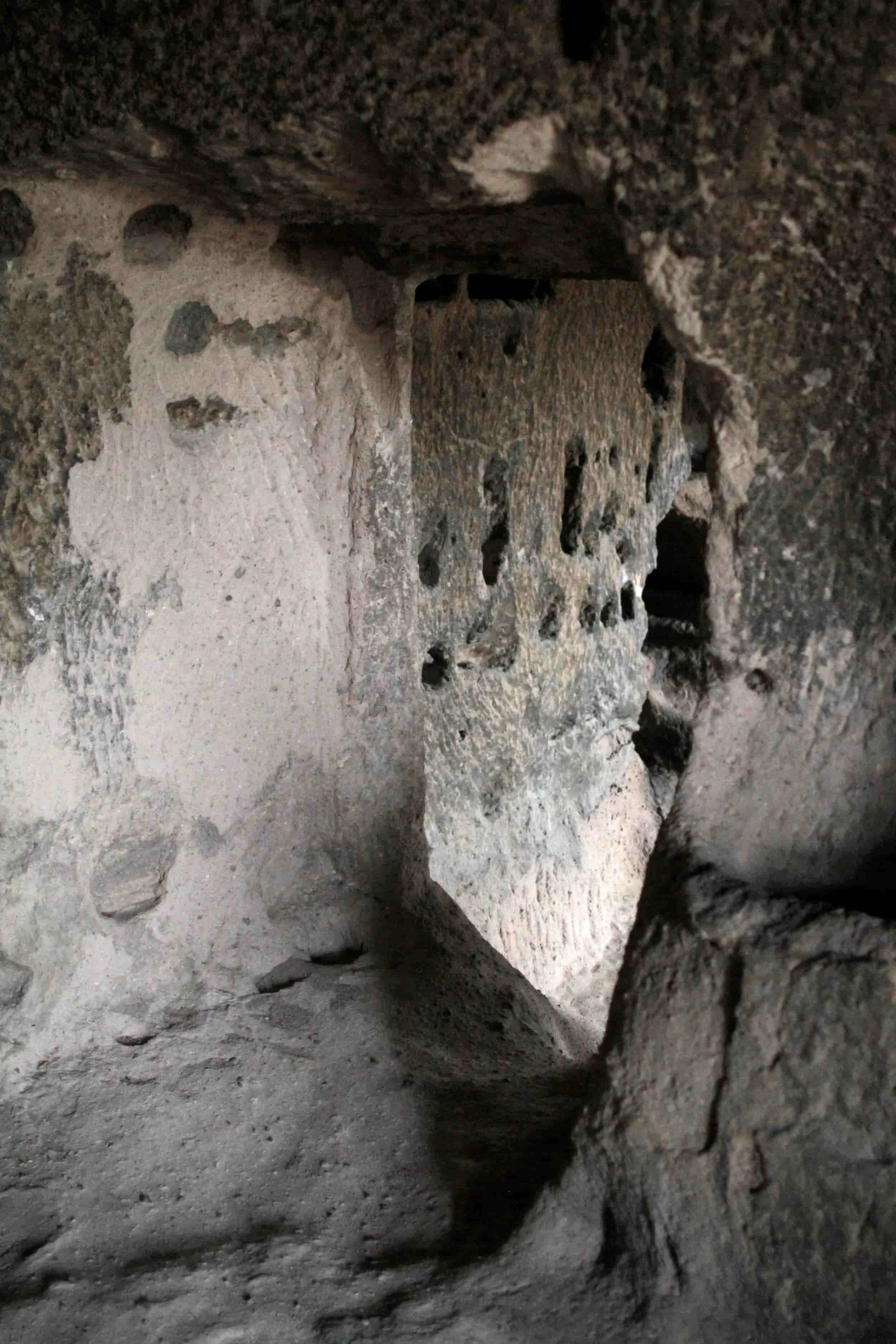Inside a rocky outcrop with carved caves at Selime Monastery in Cappadocia, Turkey