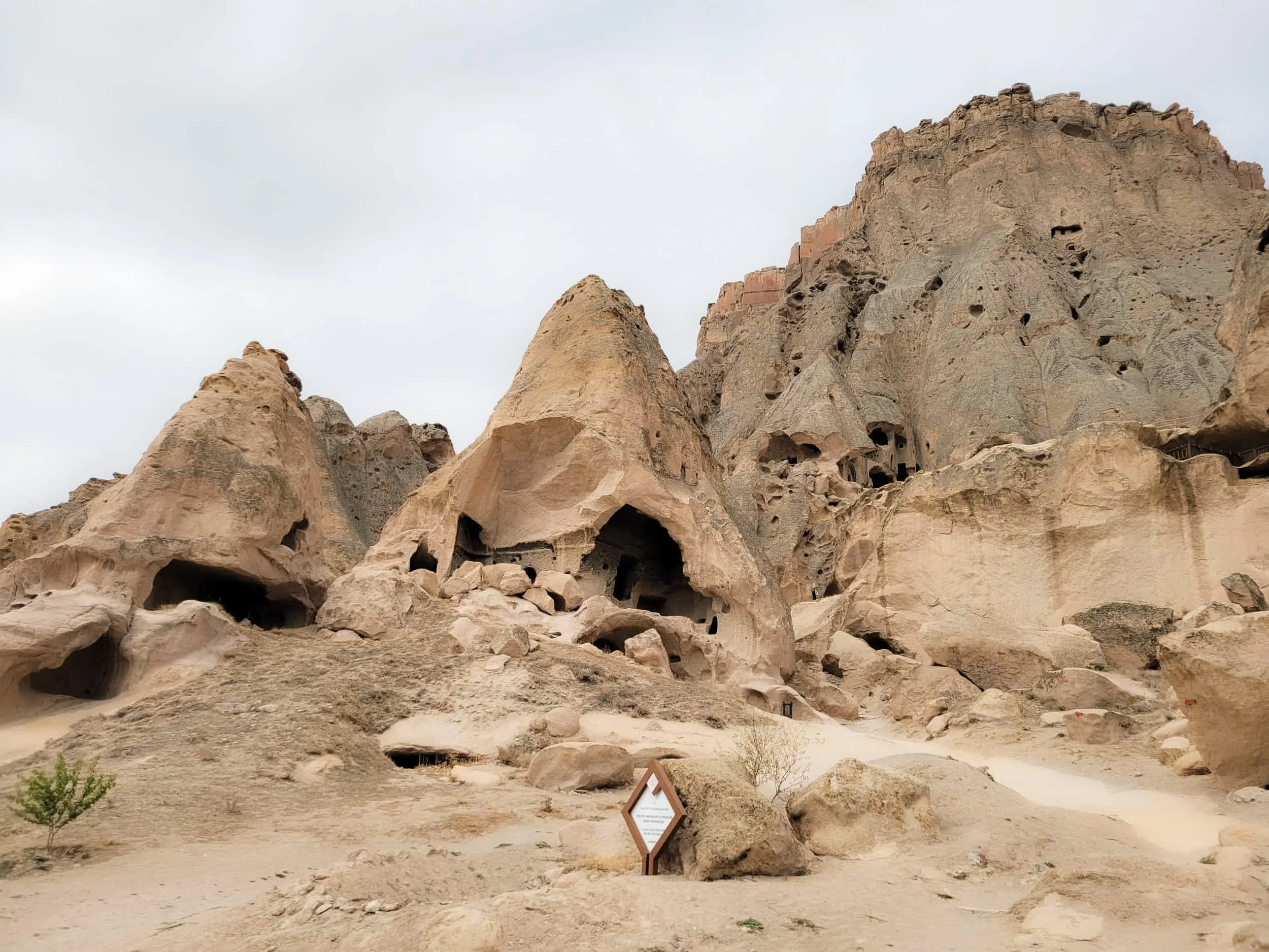 Rocky outcrop with carved caves at Selime Monastery in Cappadocia, Turkey
