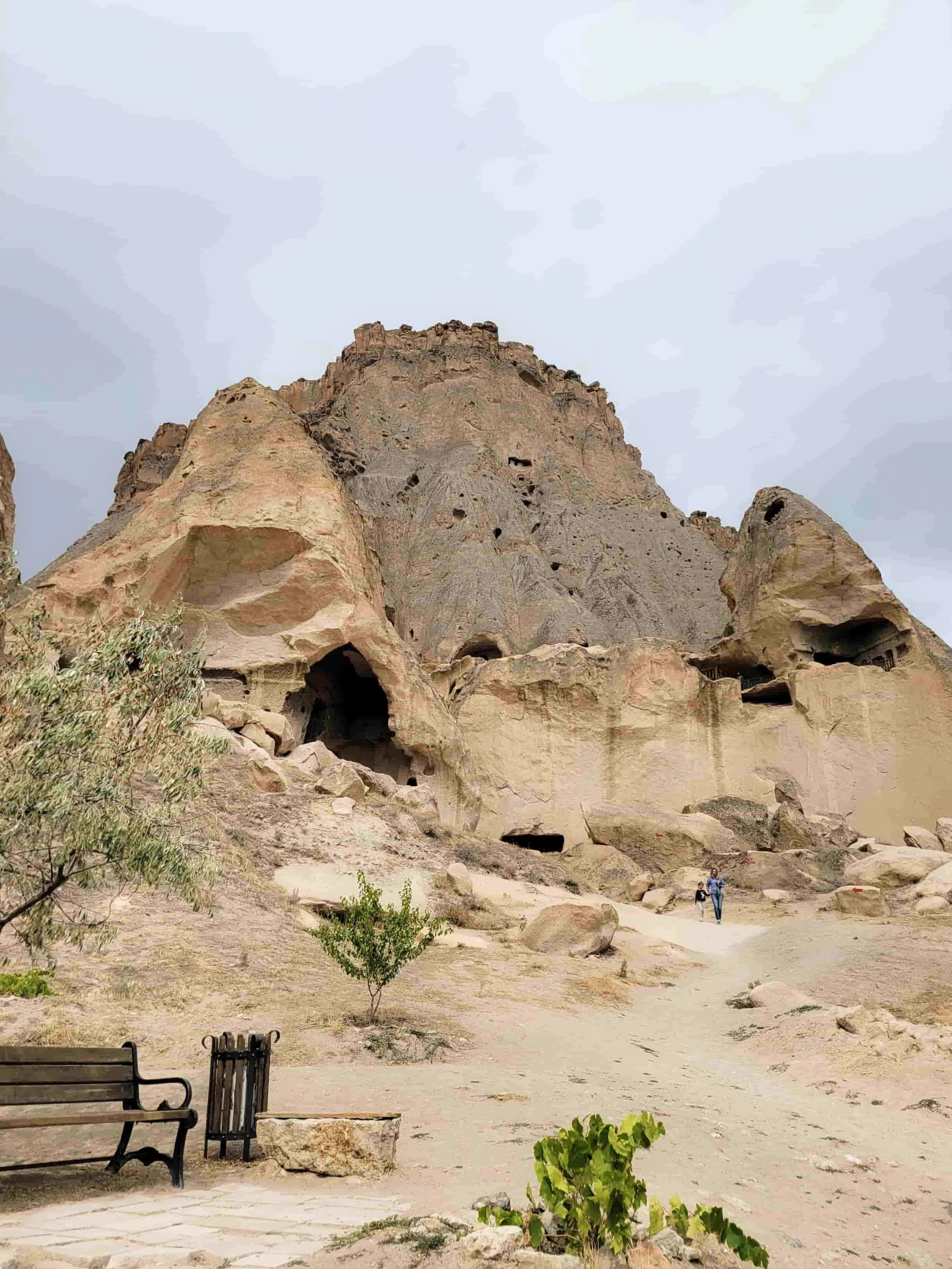 Rocky outcrop with carved caves at Selime Monastery in Cappadocia, Turkey