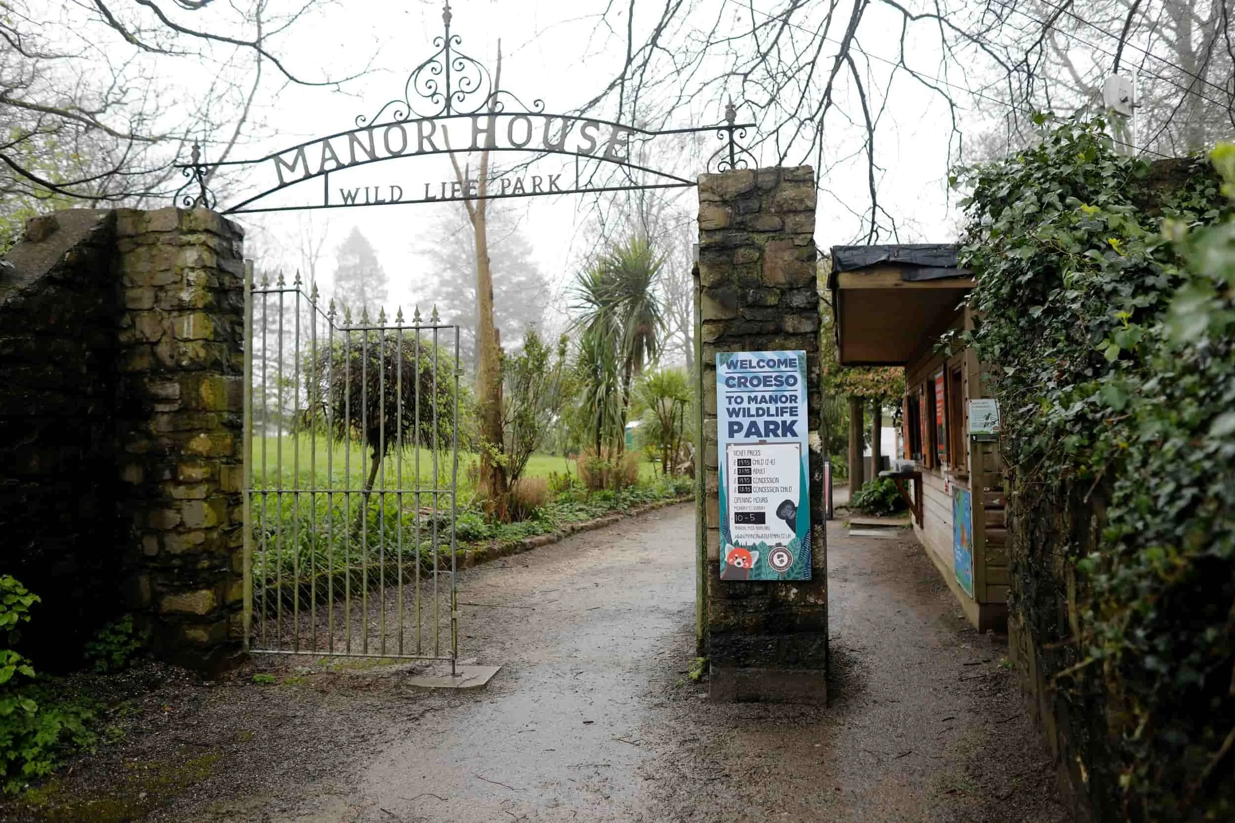 Entrance gate to Manor Wildlife Park near Tenby Wales, on a rainy day