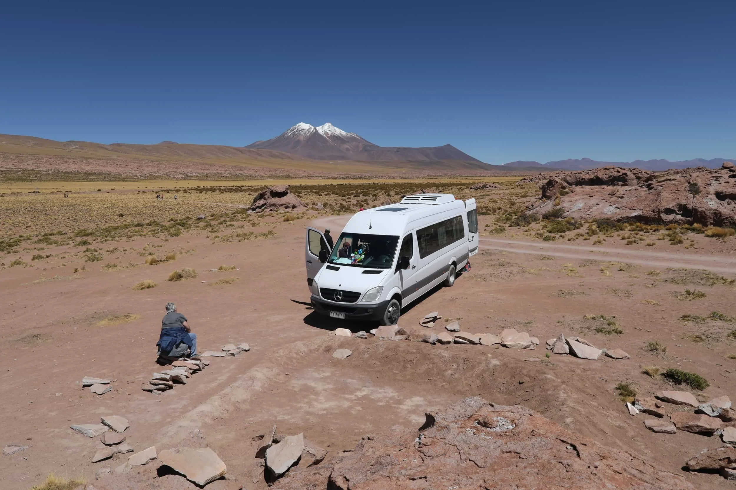 Desert views in the Atacama Desert with snow topped mountains in the background