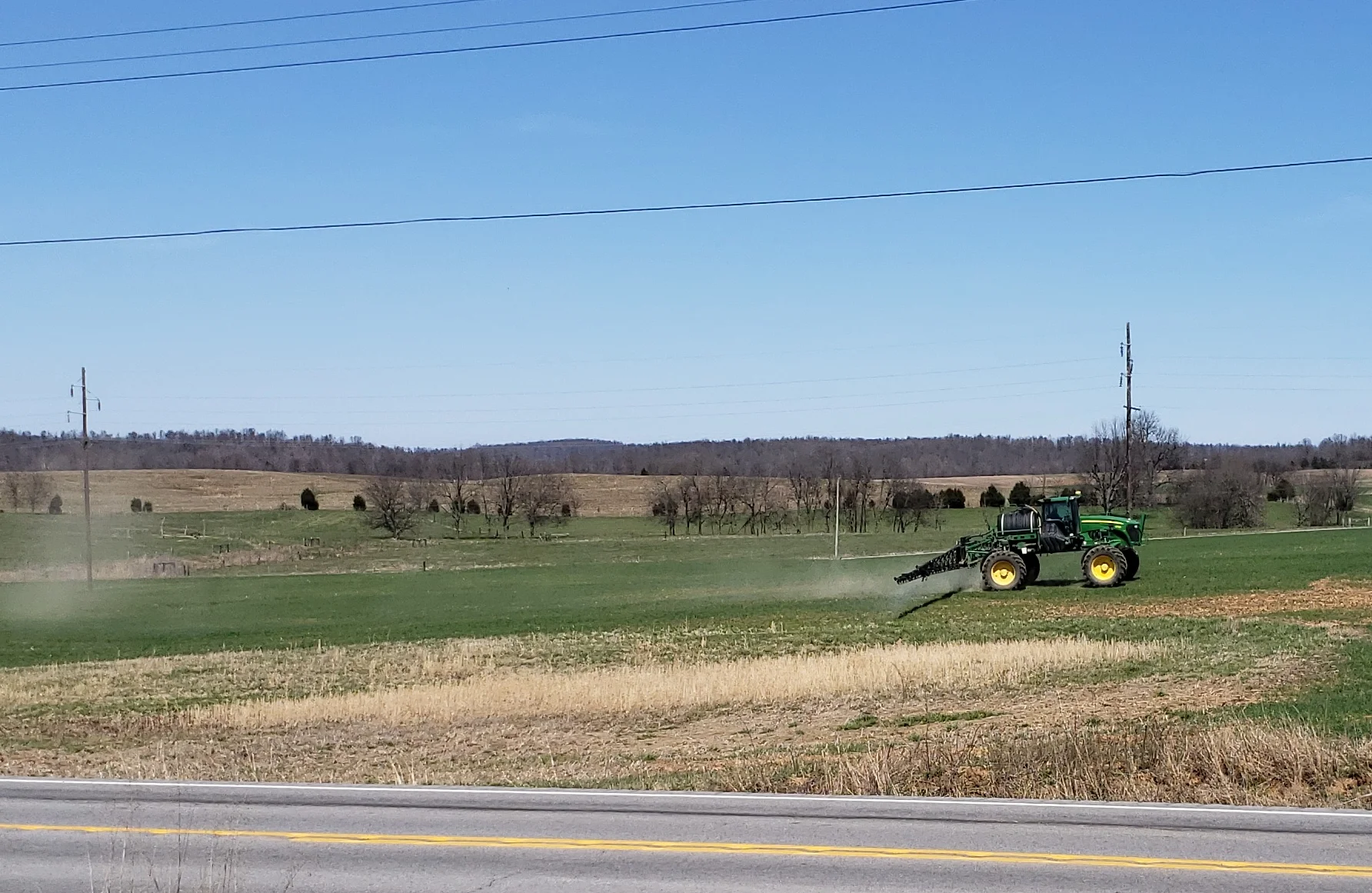 Figure 1. Farmer applying pesticides on wheat in Caldwell County, KY (March 2019) (Photo: Raul Villanueva, UK).