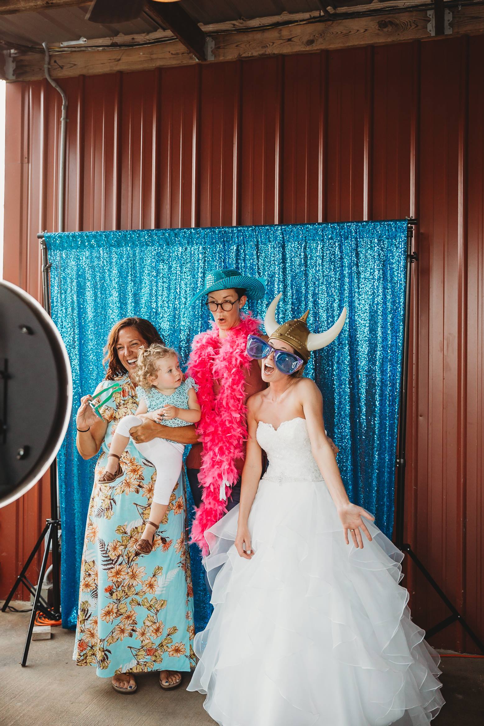 Bride and guests in a photo booth