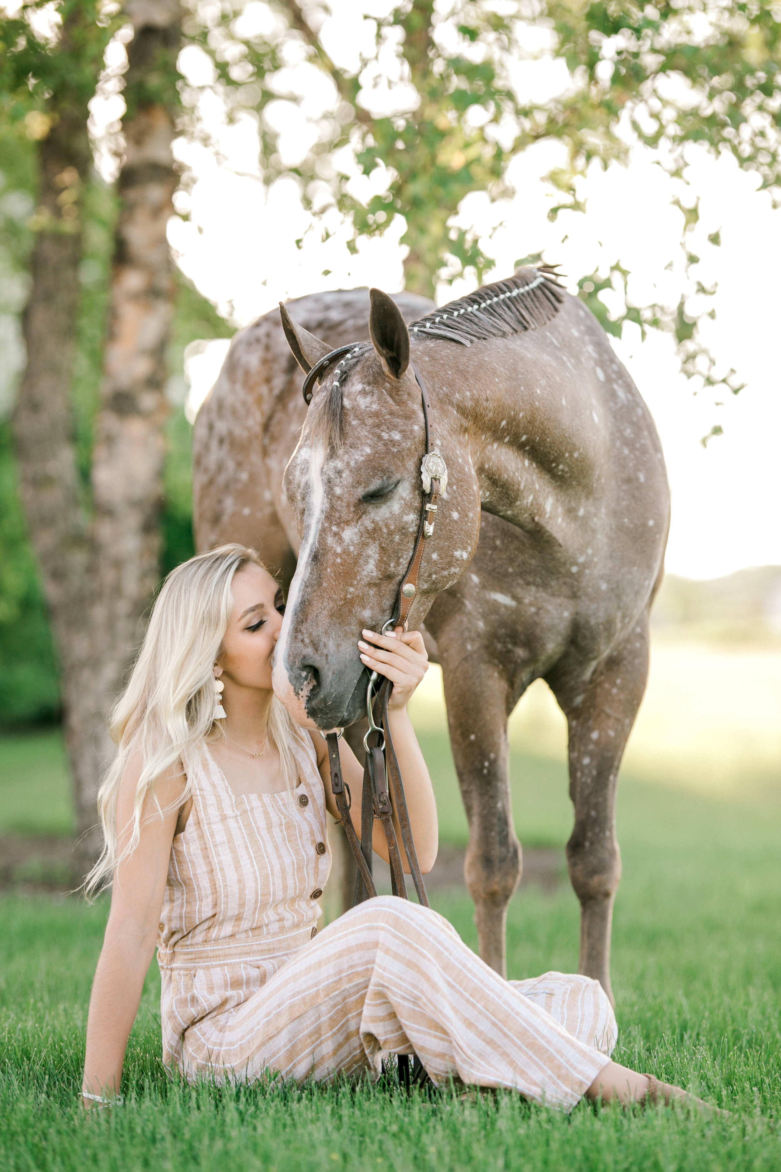 Free Photo | Fashion woman with long brown hair posing with brown horse.