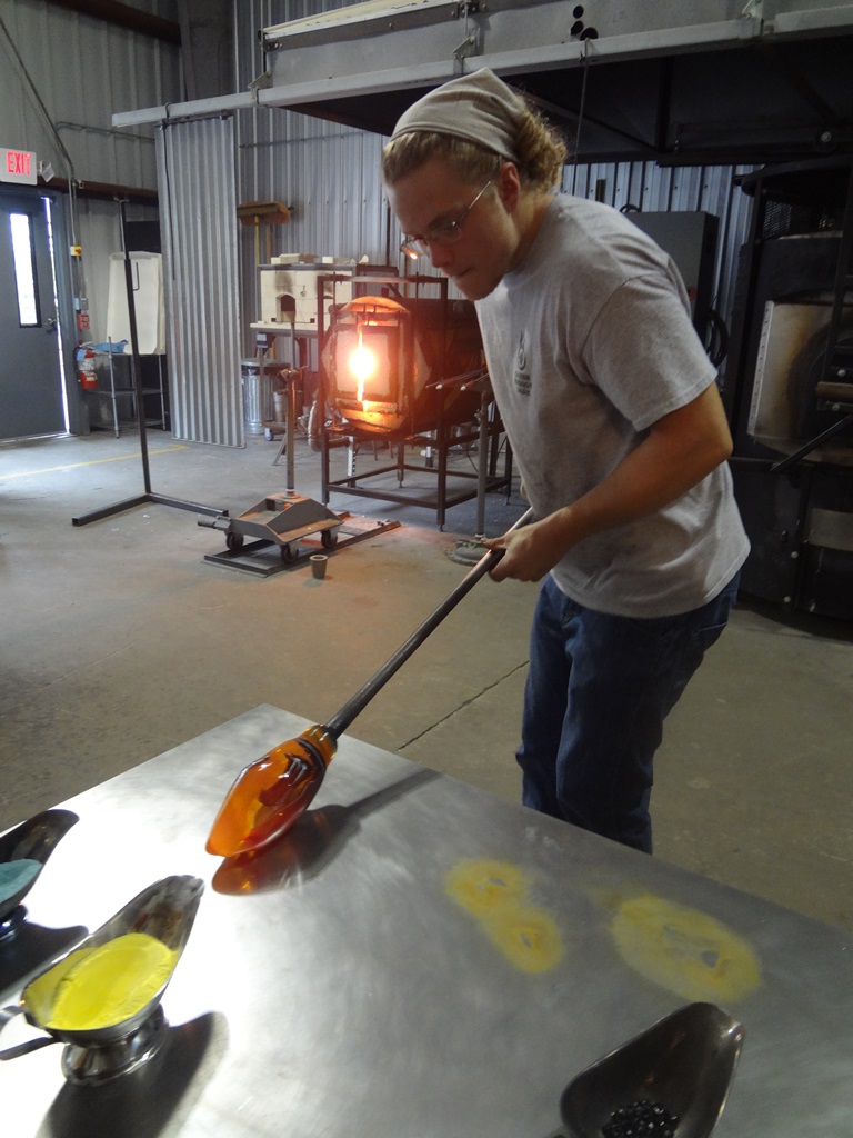  Cole Johnson blowing glass. 