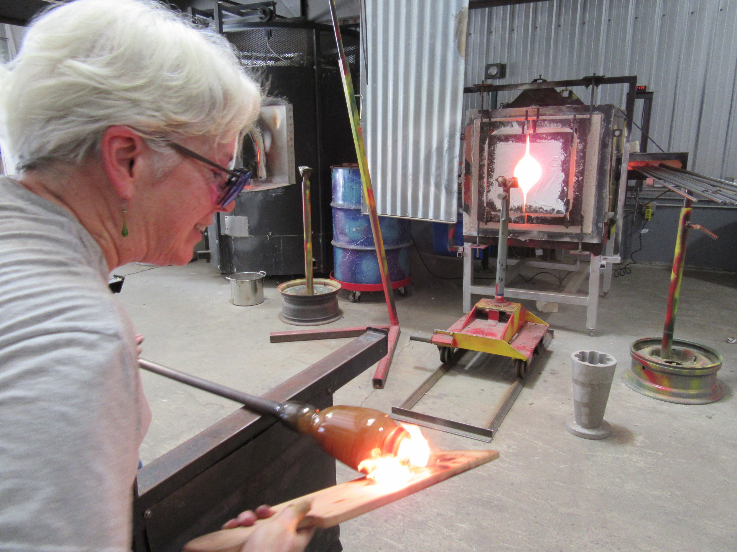 Judy McManus glassblowing.