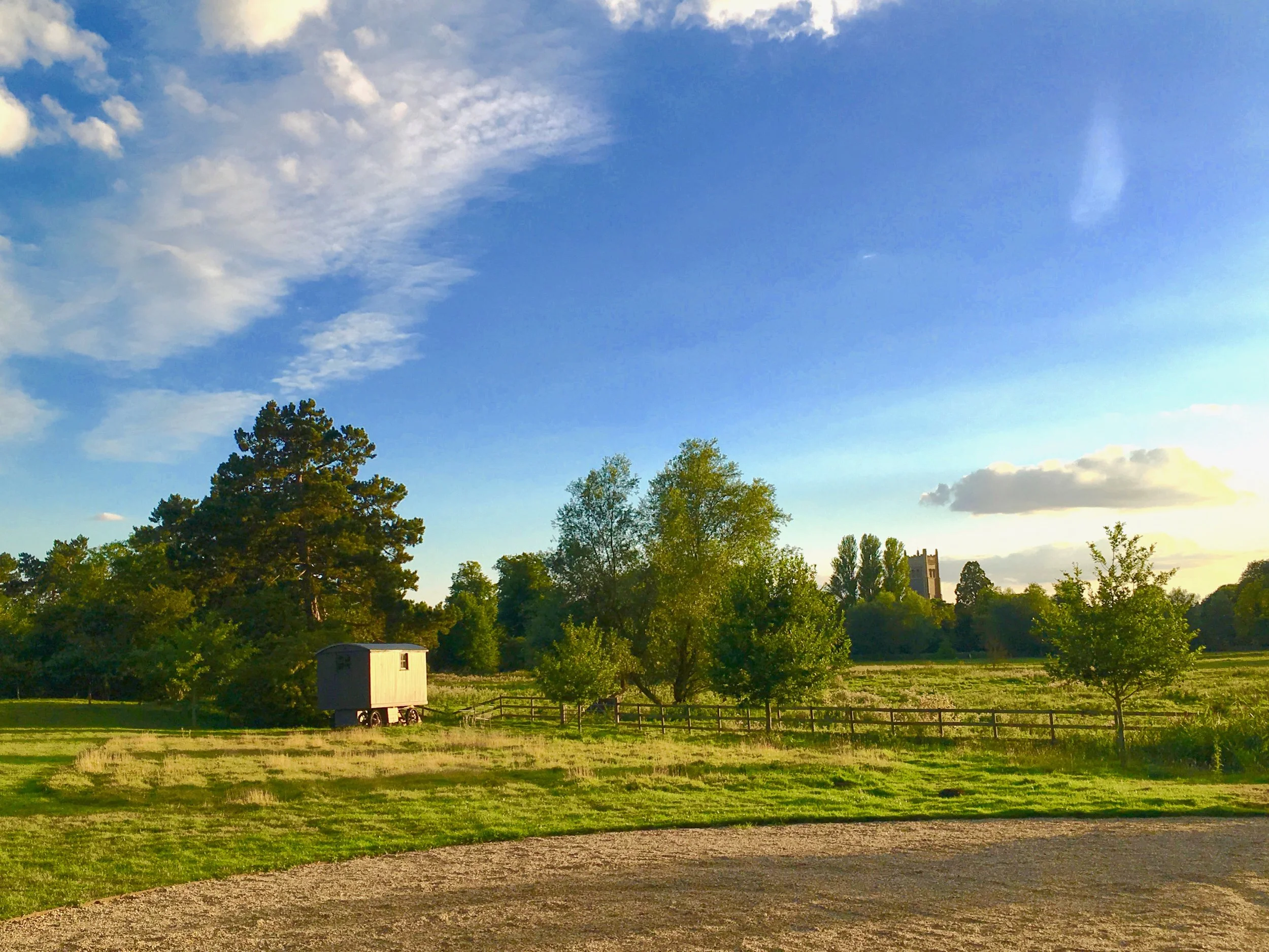 Our lovely Abbey Hut shares the south field with views across the meadows to the church, and is available to rent on Airbnb.