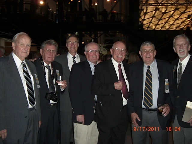 Left to Right:: Les McChristian, Clark Carlin, Mike Mazaika (Perkin-Elmer Manager), Tom O'Neil, Ray Anderson, Dave Berganini, Ed Rising. Missing is Dave Raspet.