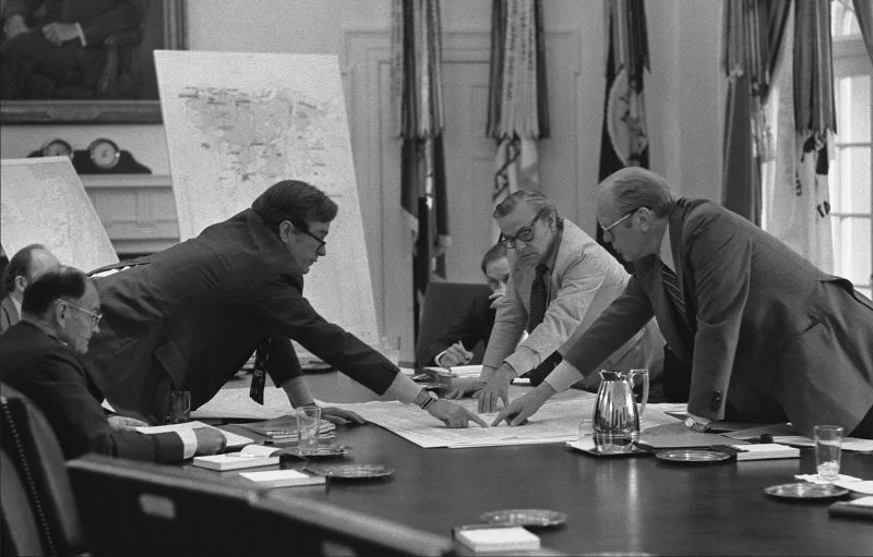 Director of the CIA George H.W. Bush briefing President Ford on the middlel east in 1974 with a Hexagon photo of the middle east (from the CIA) .jpg