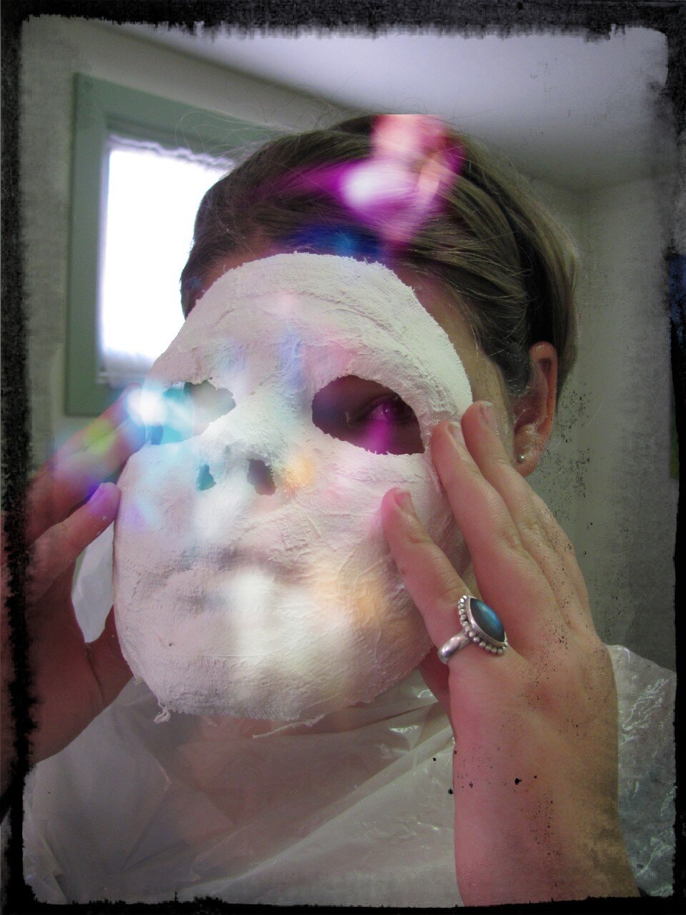 K taking off mask with special effects.jpg